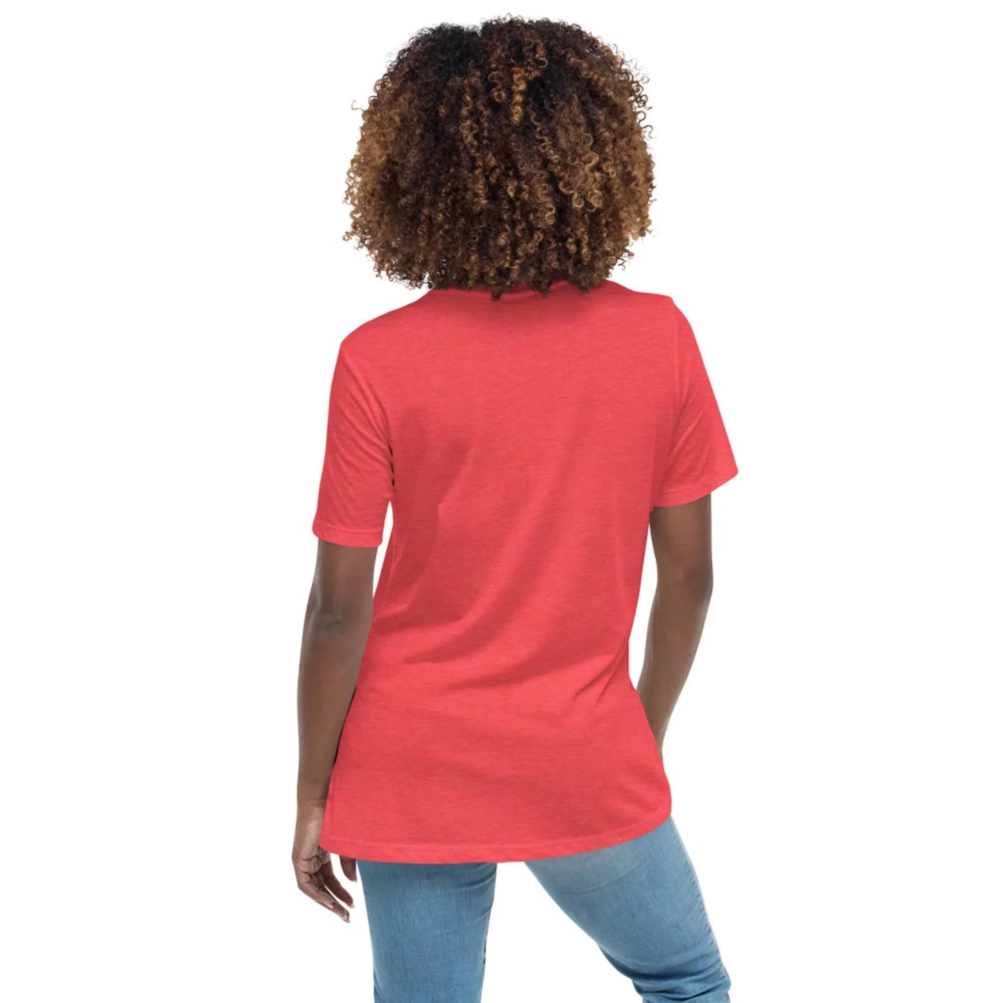 A person with curly hair stands with their back to the camera, wearing the Printful Abigail Relaxed-Fit Logo Tee for women (white logo) and blue jeans against a plain white background.