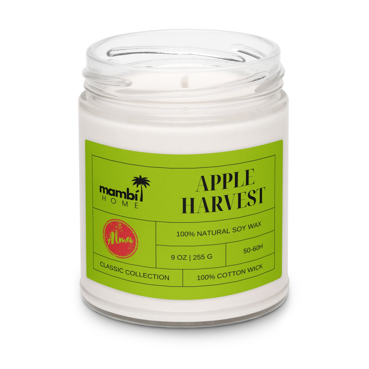 A glass jar candle with a green label reading mambi HOME, APPLE HARVEST, featuring 100% natural soy wax, 9oz, 50-60h burn time, and a 100% cotton wick. This eco-friendly candle has a red apple illustration on the label.
