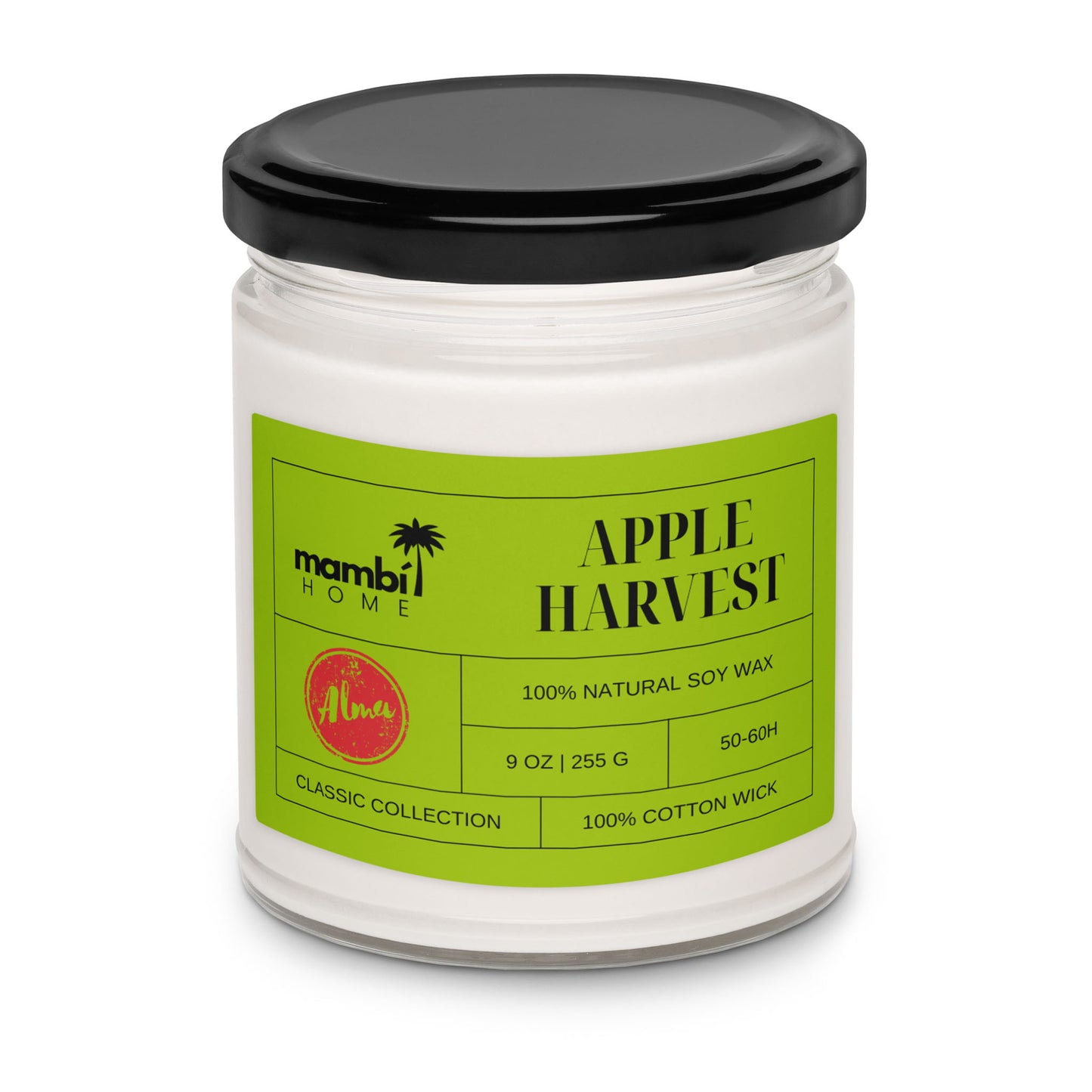 A white candle in a glass jar with a black lid. The green label reads APPLE HARVEST, mambi HOME, and highlights this eco-friendly candle made from 100% natural soy wax, 9 oz size, 50-60h burn time, and a 100% cotton wick.
