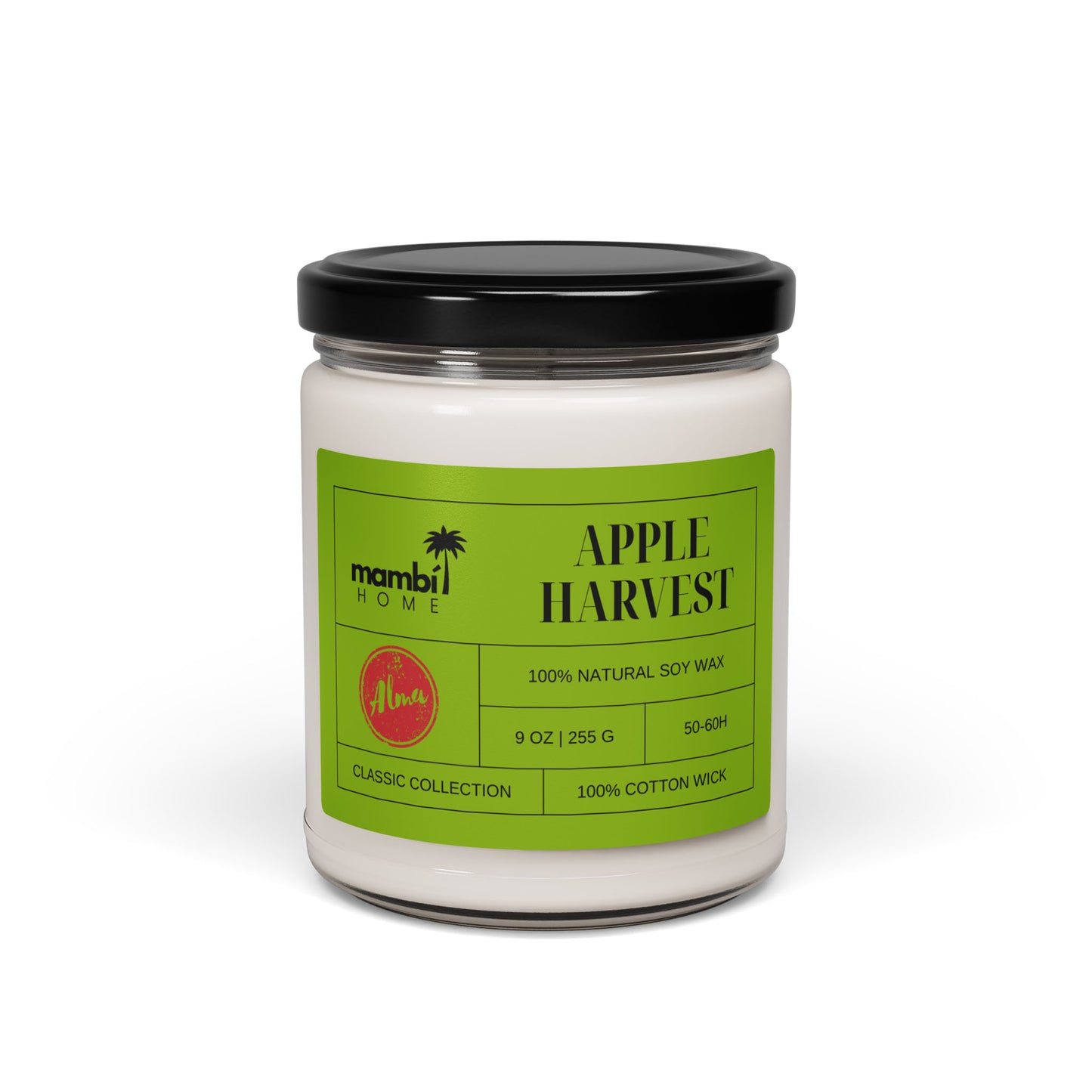 A white candle in a glass jar with a black lid features a green label reading Mambi Home and Apple Harvest. This 9 oz (255g) candle is made of natural soy wax, perfect for those seeking eco-friendly candles.