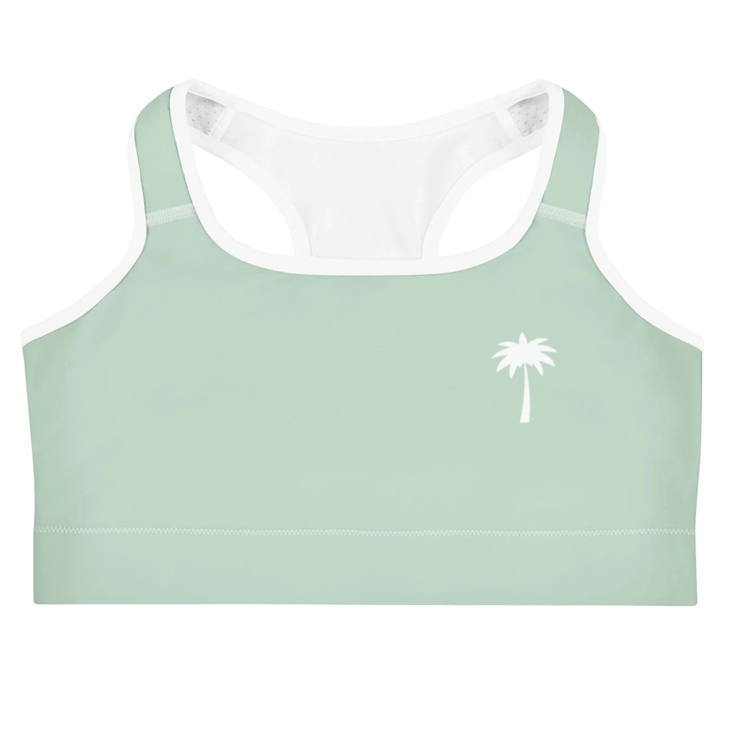 Light green Mambí sports bra with white trim and a simple white palm tree graphic on the left chest, displayed against a white background.