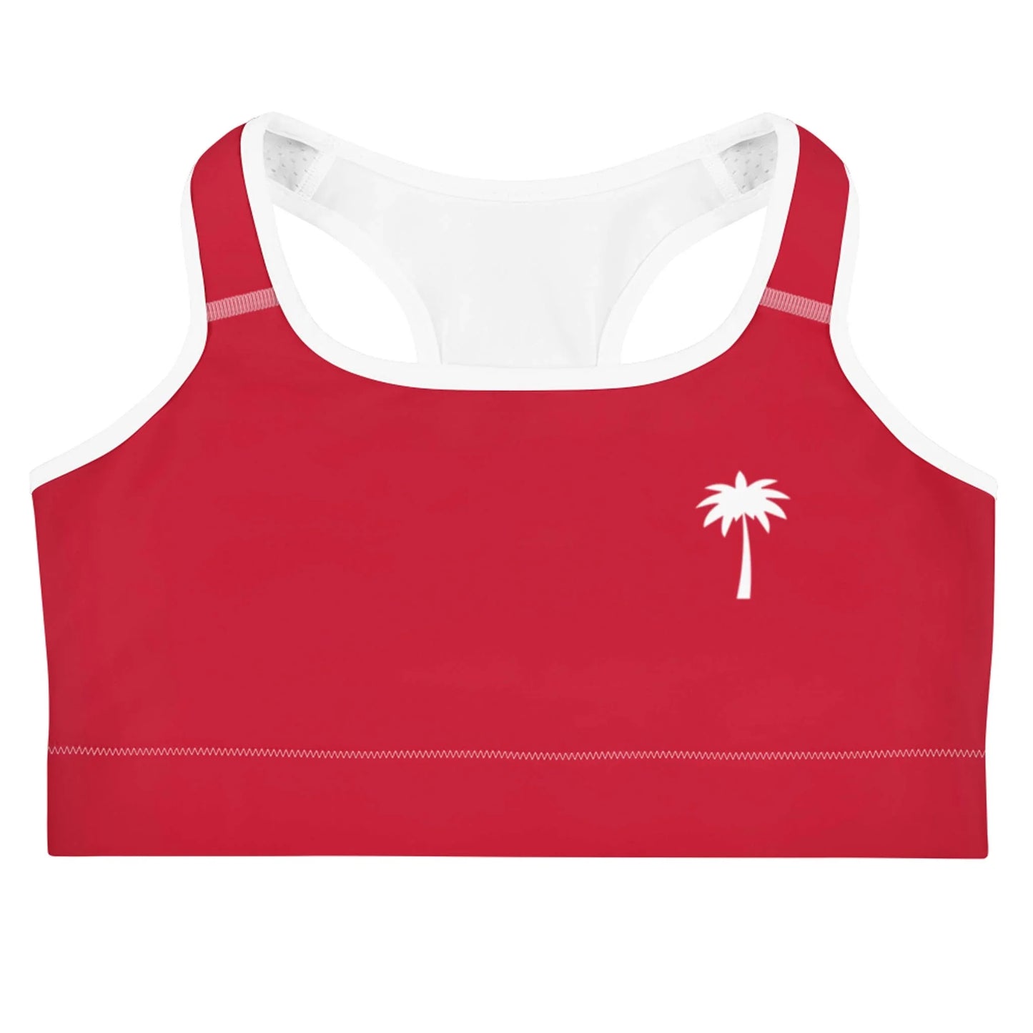 A red Mambí sports bra with white trim and a small white palm tree graphic on the left chest. The background is plain white.