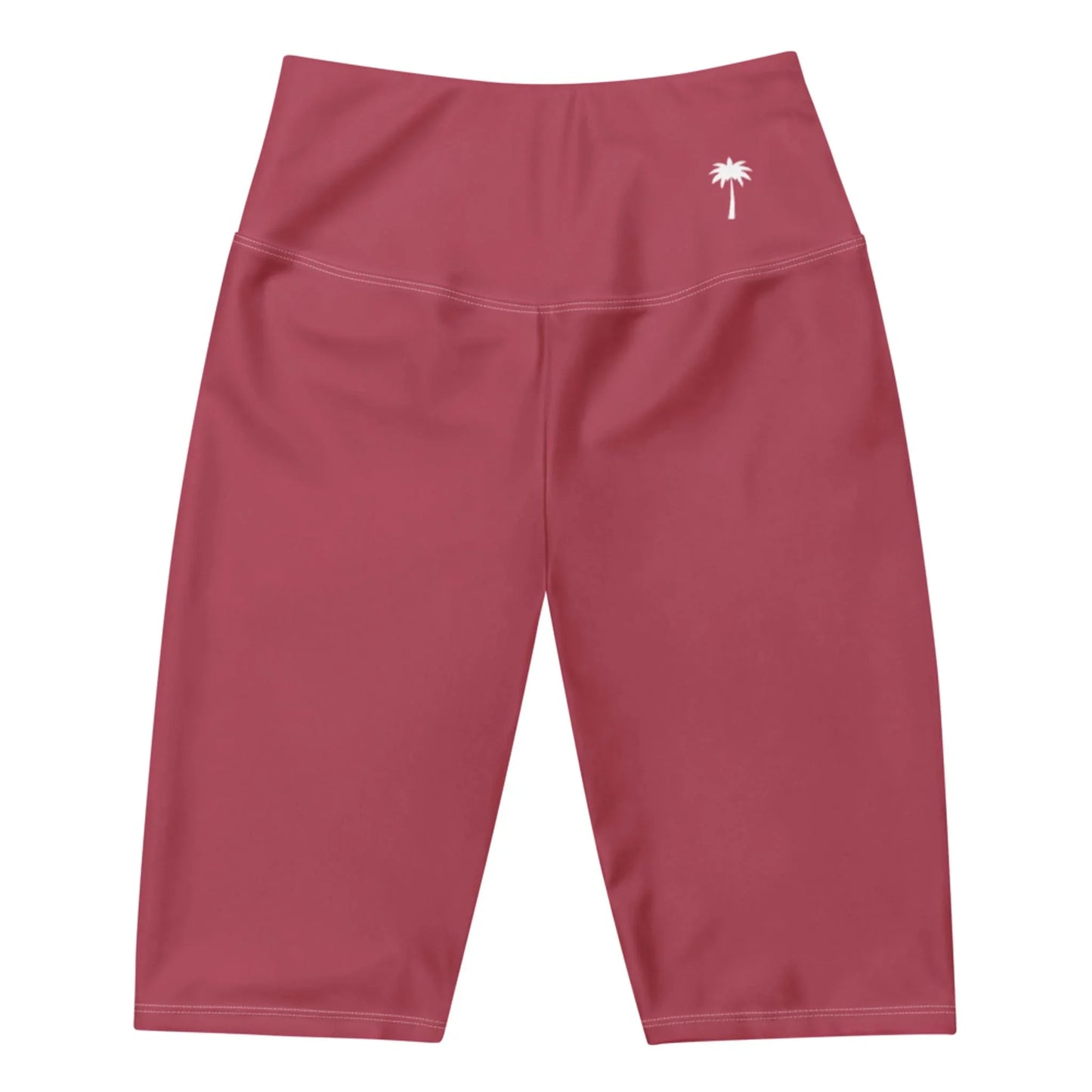 High-waisted, knee-length magenta athletic shorts with a small white palm tree logo and subtle Mambí branding on the left hip, displayed on a white background.