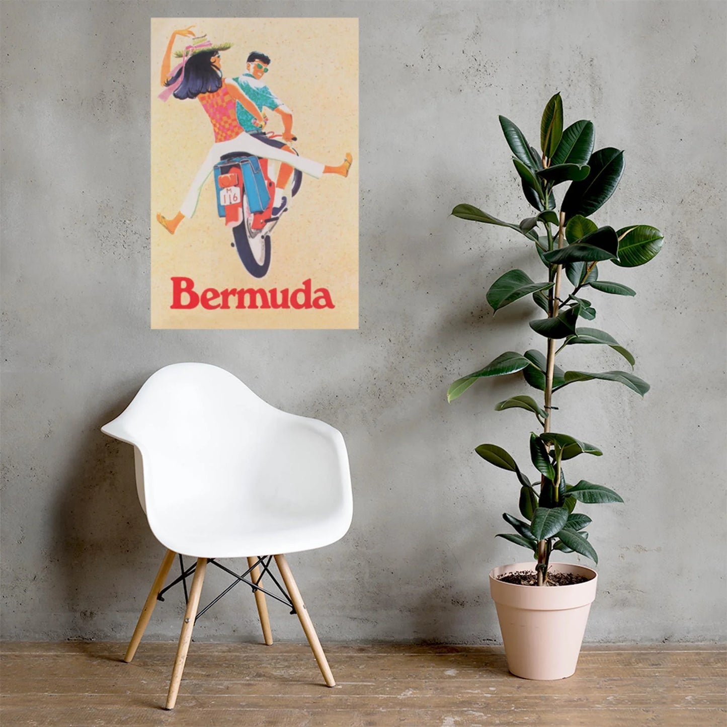 A white modern chair and a potted plant sit by a gray wall, topped with Printfuls Bermuda Reprinted Vintage Poster, 24x36 on premium luster paper—featuring a couple riding a scooter with the woman playfully kicking her leg.