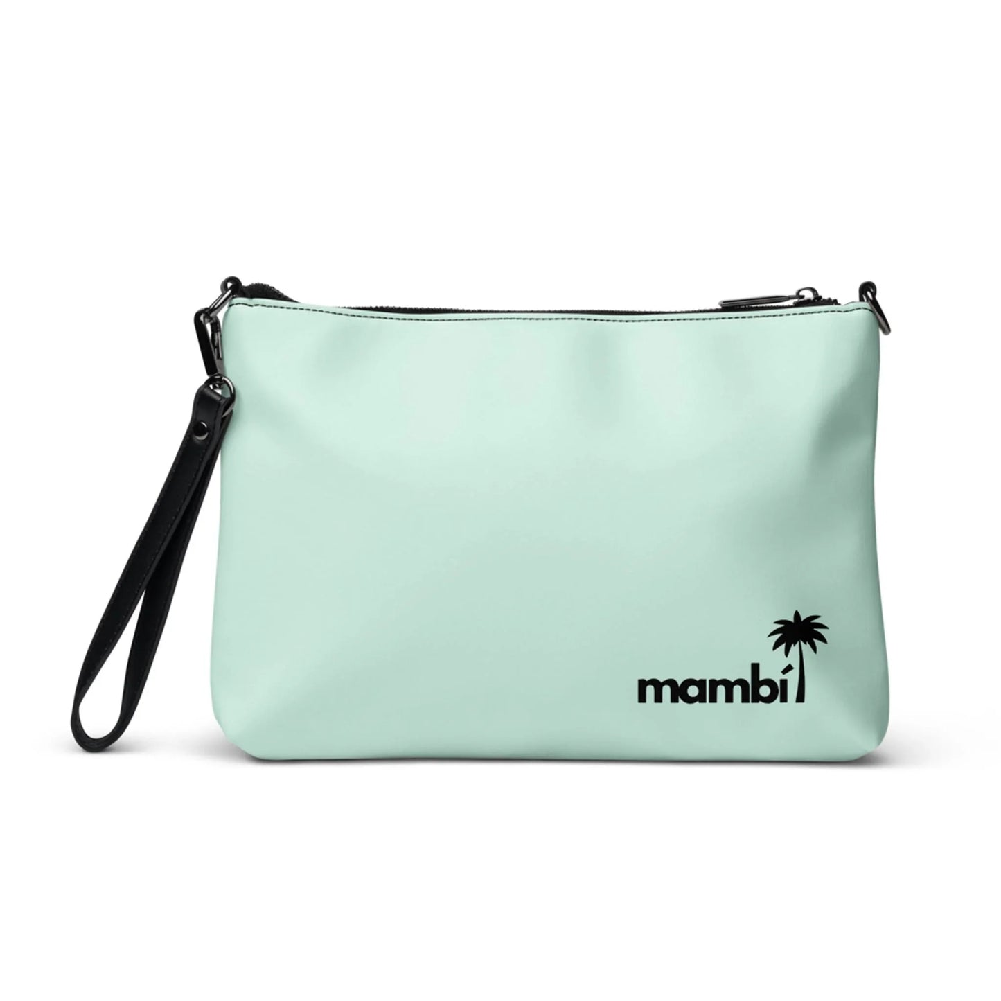 The Blake Crossbody Bag by Printful is a light blue faux leather zippered pouch with a black wrist strap, featuring mambi and a palm tree graphic in black on the lower right corner.