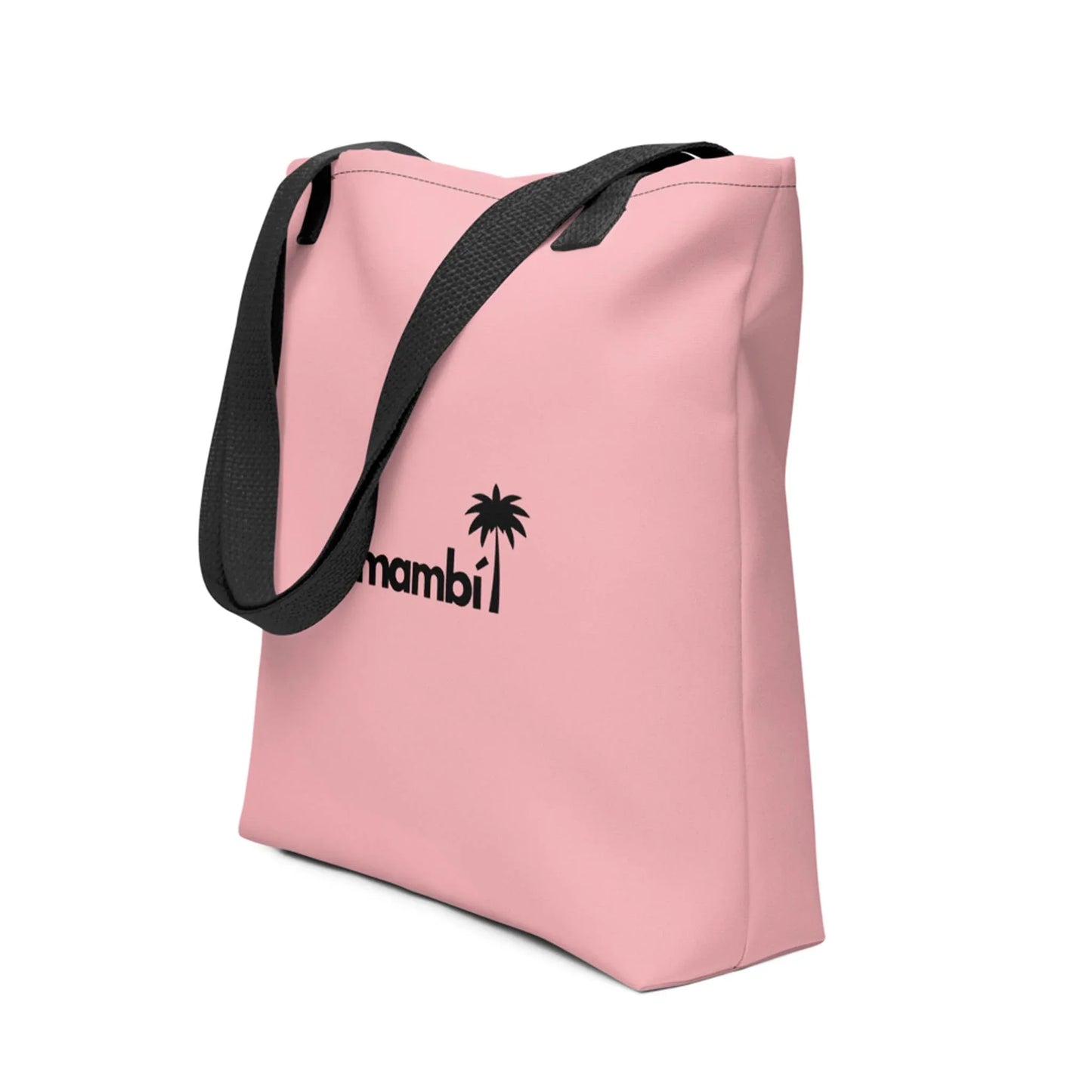 A pink tote bag with black straps features a black palm tree graphic and the word Mambí on the front.