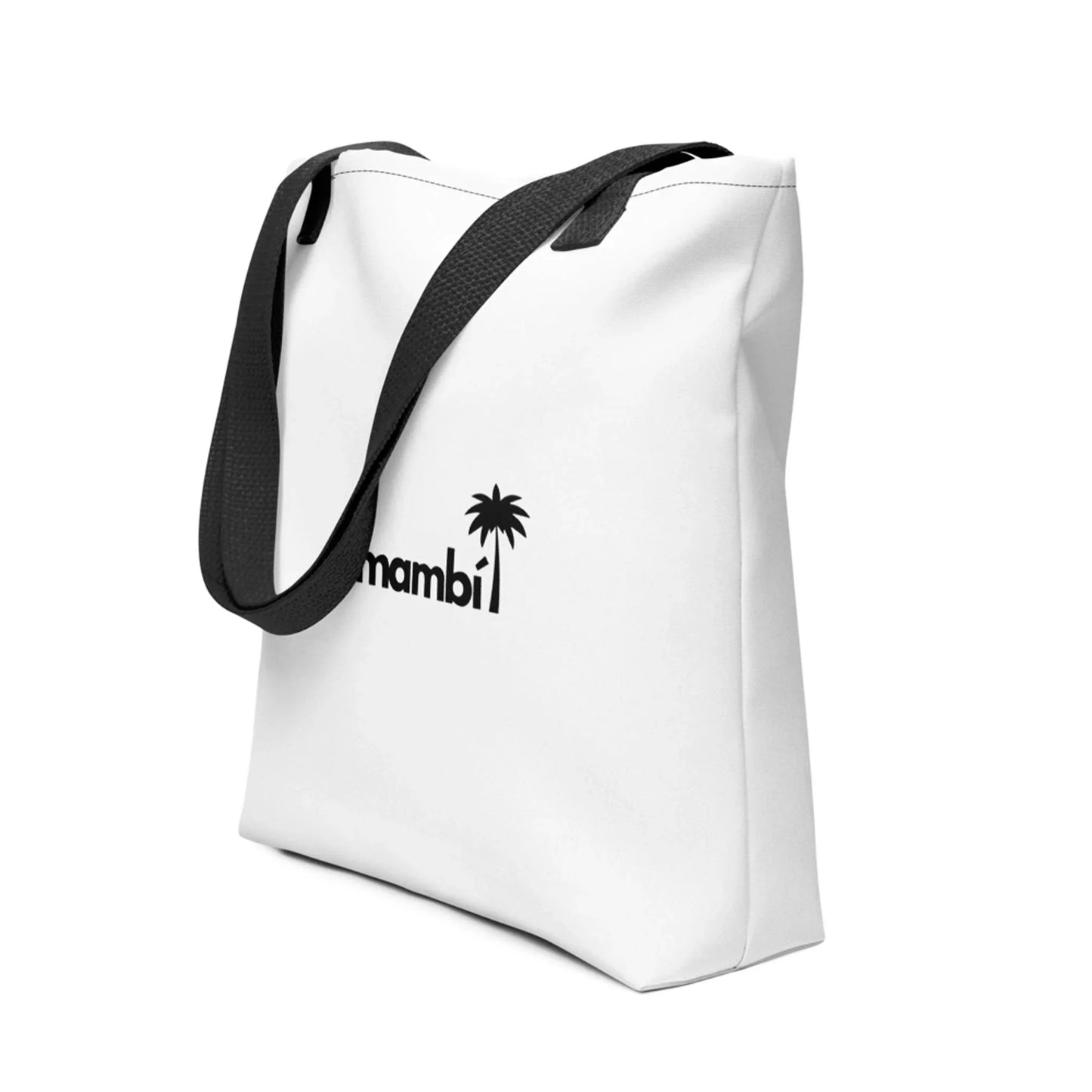 A white tote bag with black handles features a black palm tree graphic and the partially visible word Mambí on the front. The bag is angled to showcase its side and front.
