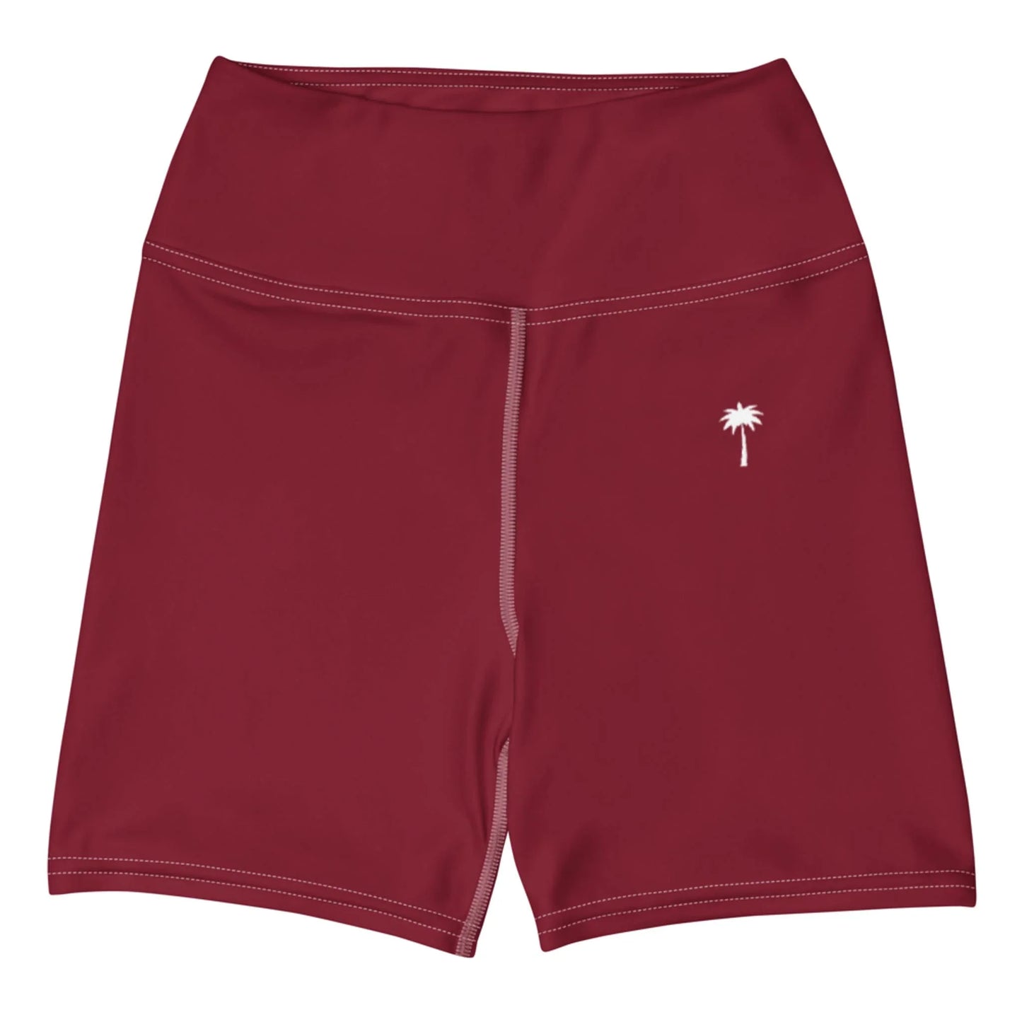 The Brickell Yoga Shorts by Printful feature a high waist, maroon color, white stitching, four-way stretch fabric, and a small white palm tree graphic on the left thigh.