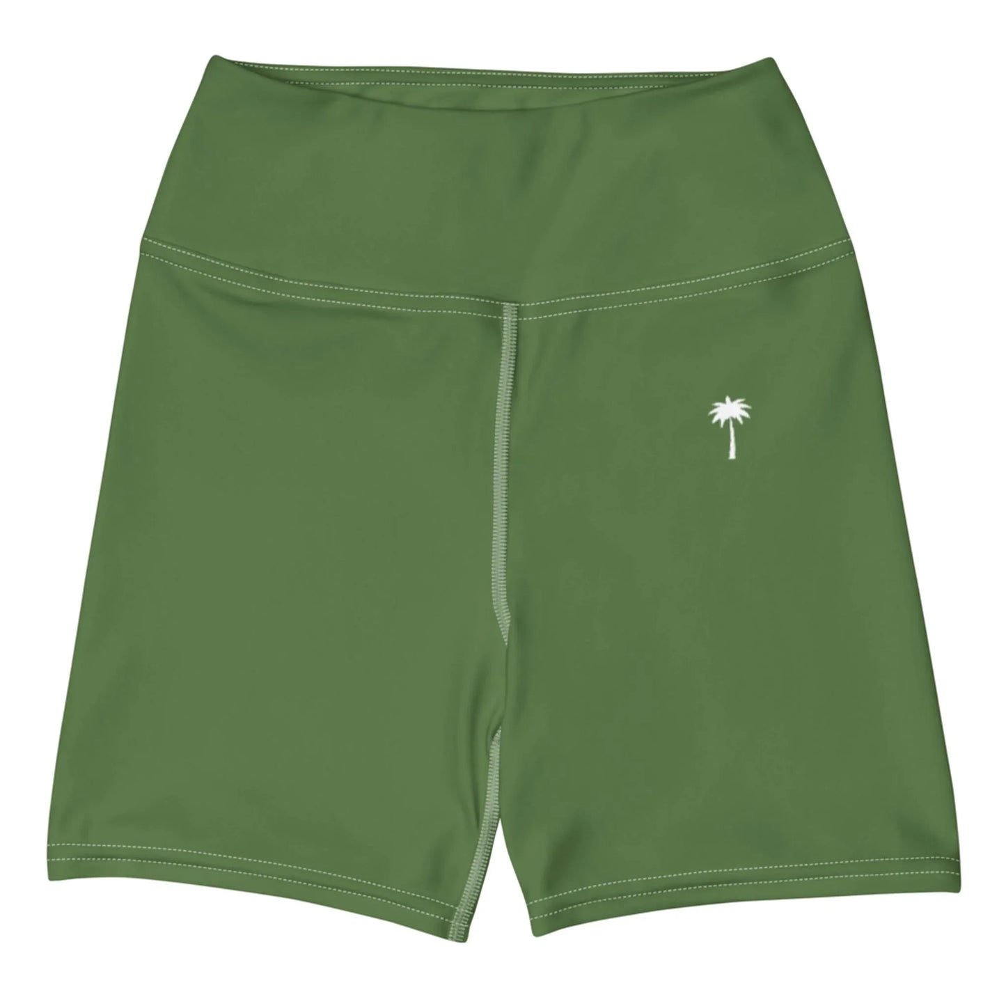 The Brickell Yoga Shorts for women by Printful are green, high-waisted, feature white stitching, a small white palm tree graphic on the left thigh, a four-way stretch, and are shown laid flat on a white background.