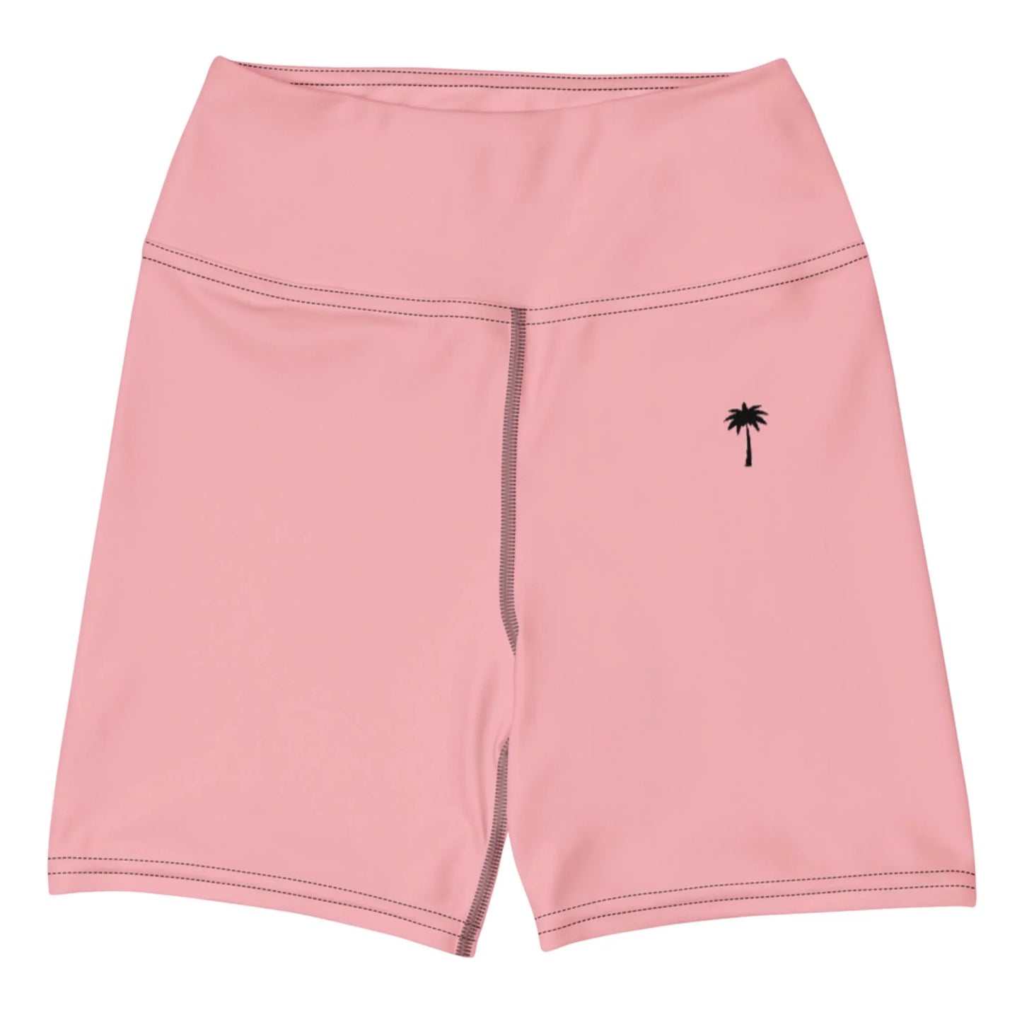 The Brickell Yoga Shorts by Printful are pink, high-waisted shorts with a high waistband, dark stitching, and a small black palm tree graphic on the left leg. Made from four-way stretch fabric. Displayed flat on a white background.