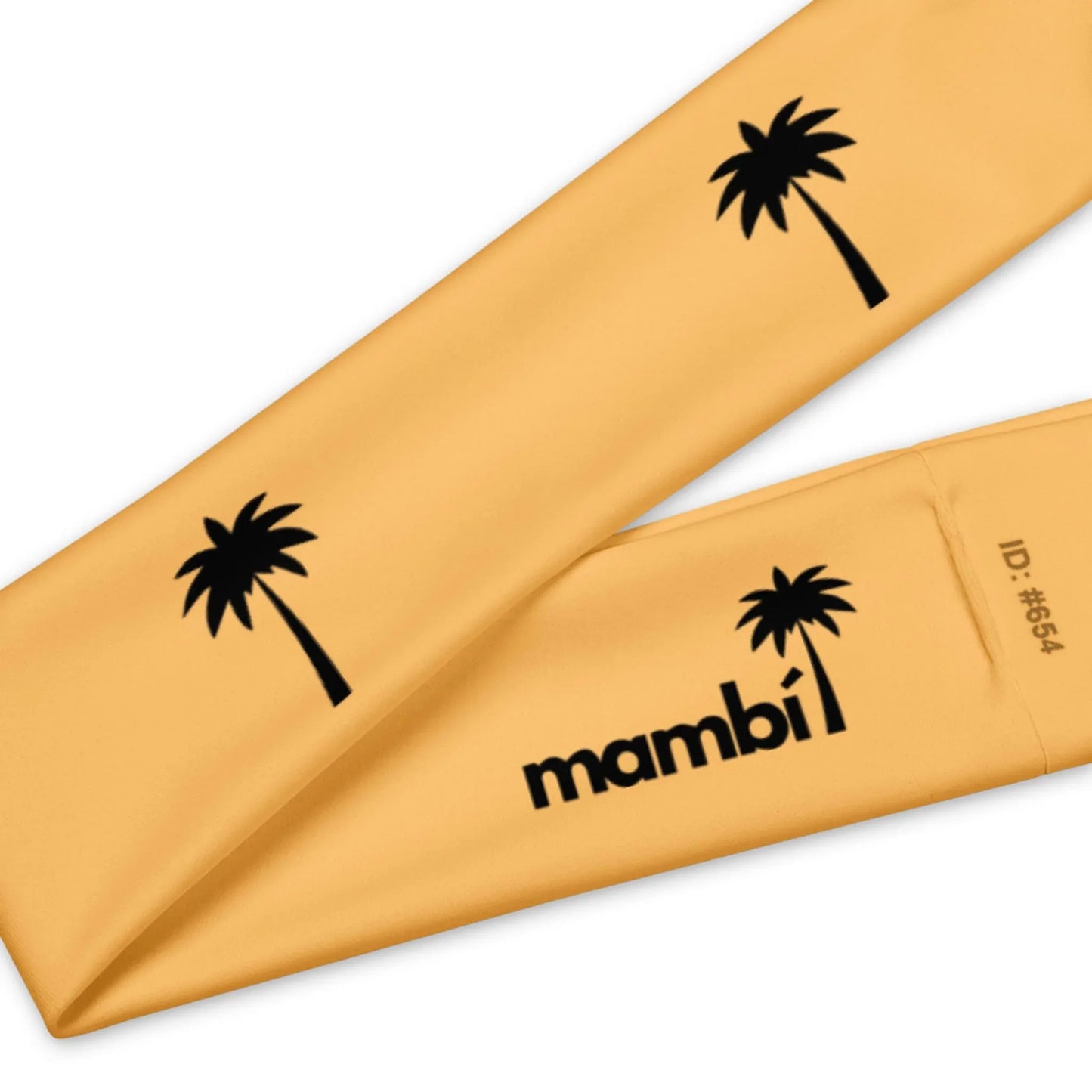 Yellow fabric with black palm tree graphics and the word Mambí printed in bold letters, plus ID: #654 on one end.