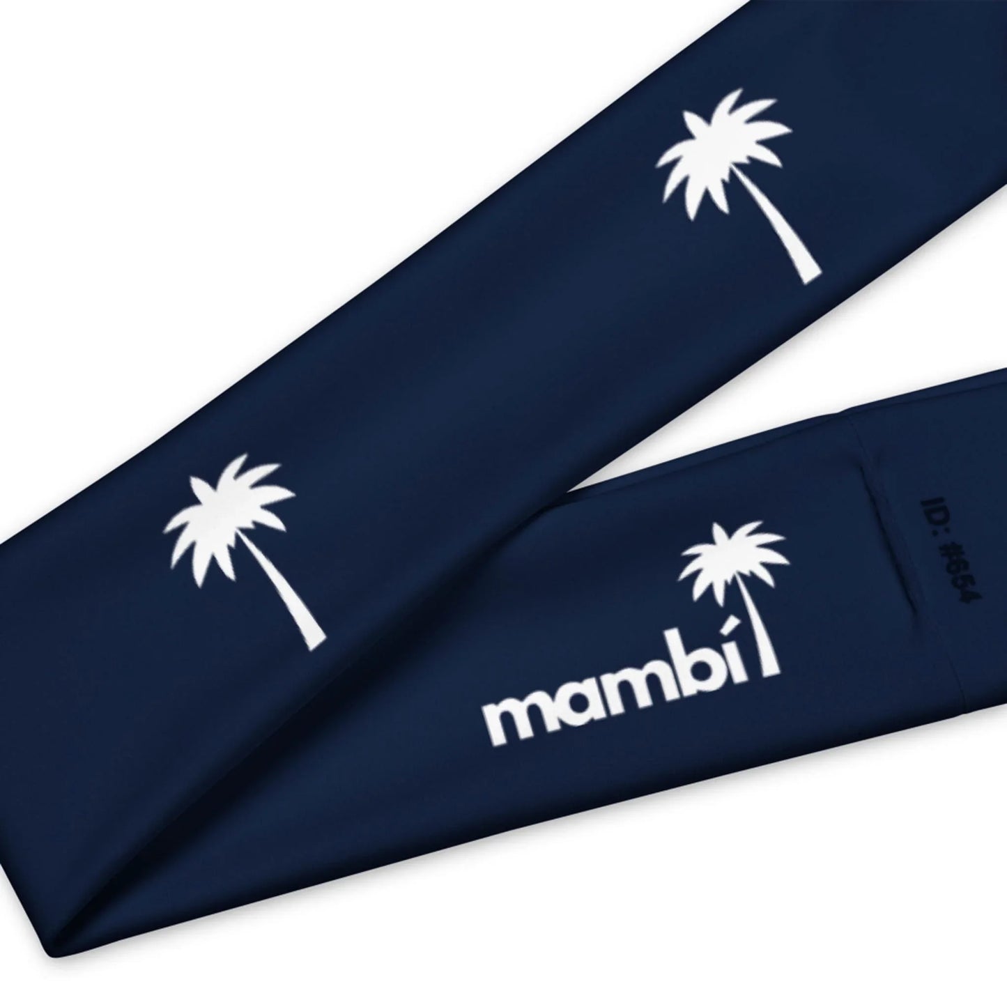 Navy blue fabric featuring white palm tree graphics and the word Mambí printed in white, along with an alphanumeric ID: #8654.