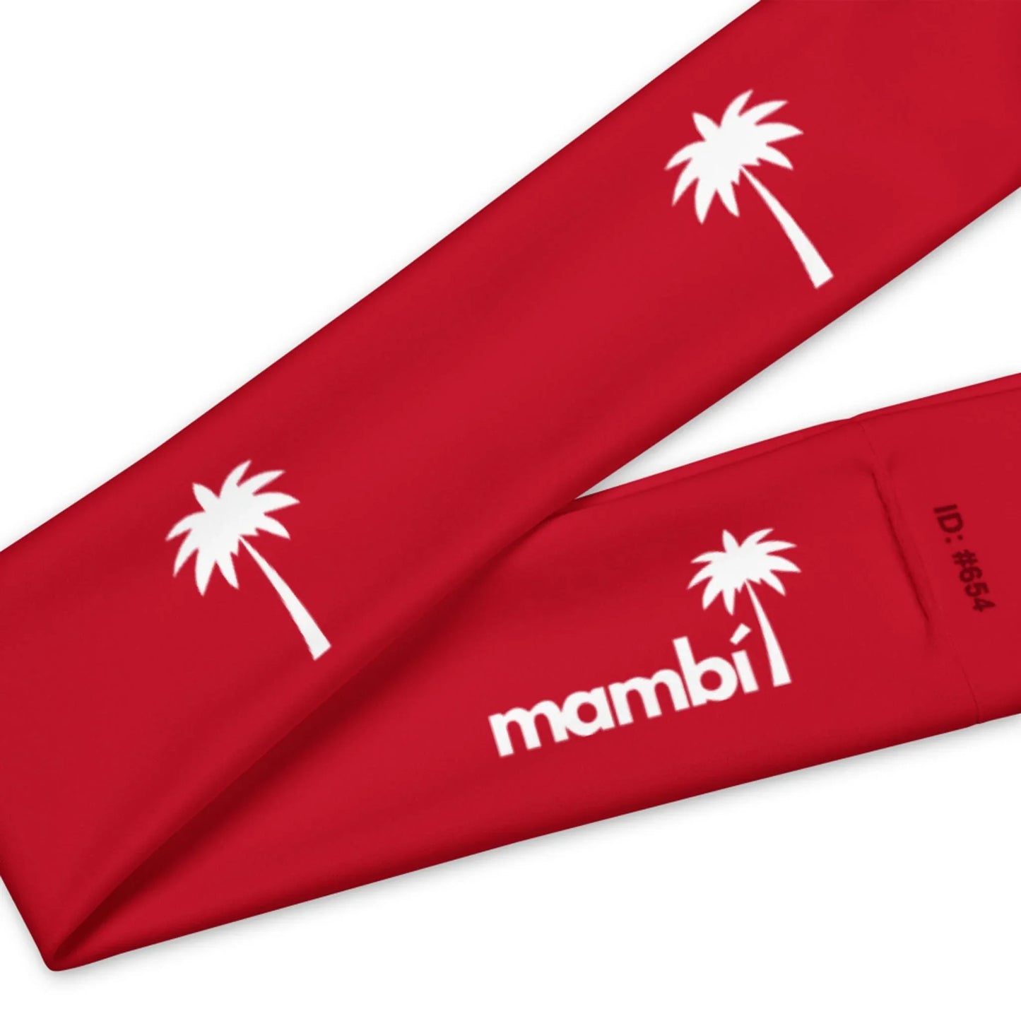 A close-up of a red fabric band showcasing white palm tree icons and the word Mambí in white text, along with the identifier ID: #654.