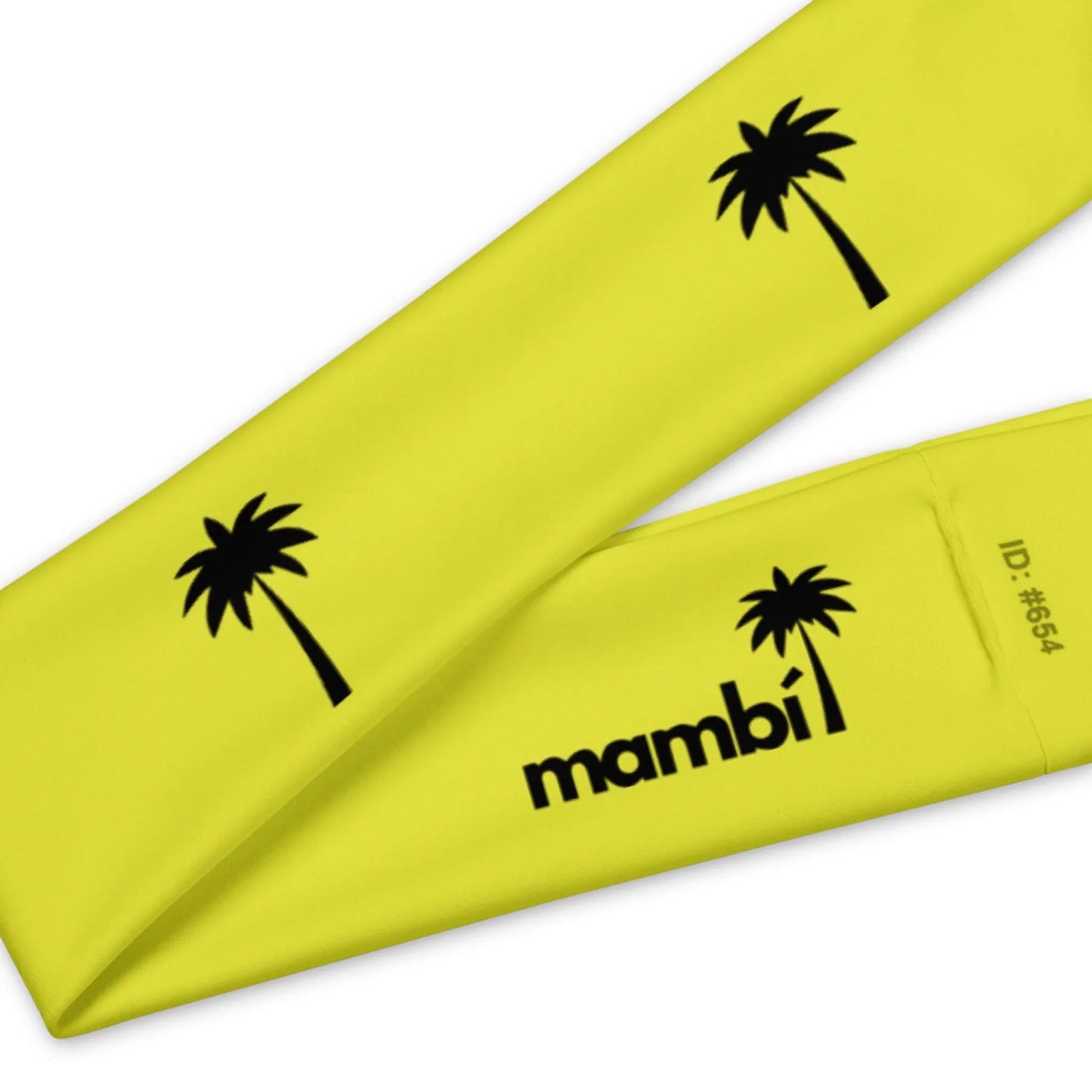 A yellow fabric band featuring black palm tree graphics and the word Mambí, along with an ID number #654.