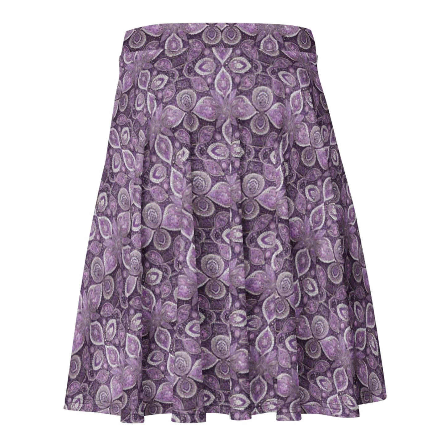 The Candelaria Skater Skirt by Printful is a flared, knee-length skirt with a purple and white floral paisley pattern, flowy design, and no visible waistband or fastenings for a flattering silhouette.
