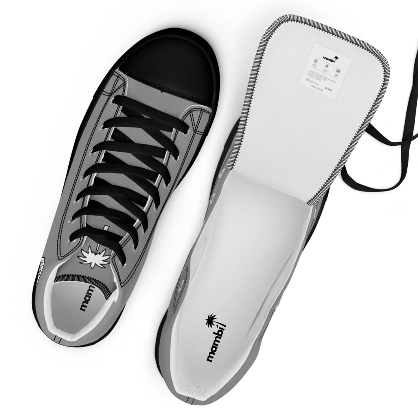 Top view of a gray Mambí sneaker with black laces, next to its matching removable insole, both featuring a palm tree logo and the brand name. The tongue tag displays size details.