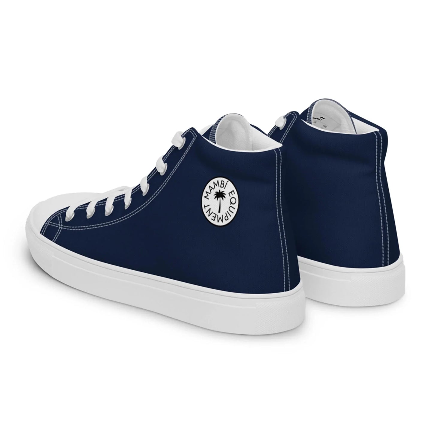 The Carlito Sastre Vintage Hi-Top Sneakers by Printful feature a navy canvas upper, white soles and laces, plus a round palm tree “MIAMIBEACH” logo on the ankle. They are displayed angled on a white background.