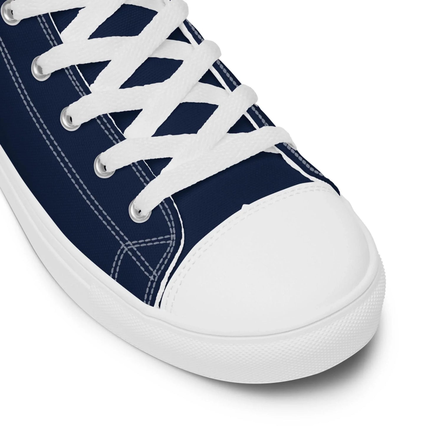 The Carlito Sastre Vintage Hi-Top Sneakers by Printful for men feature a white/navy canvas upper, white laces, stitching, and a classic rubber toe cap and sole—showcasing timeless style against a clean white background.