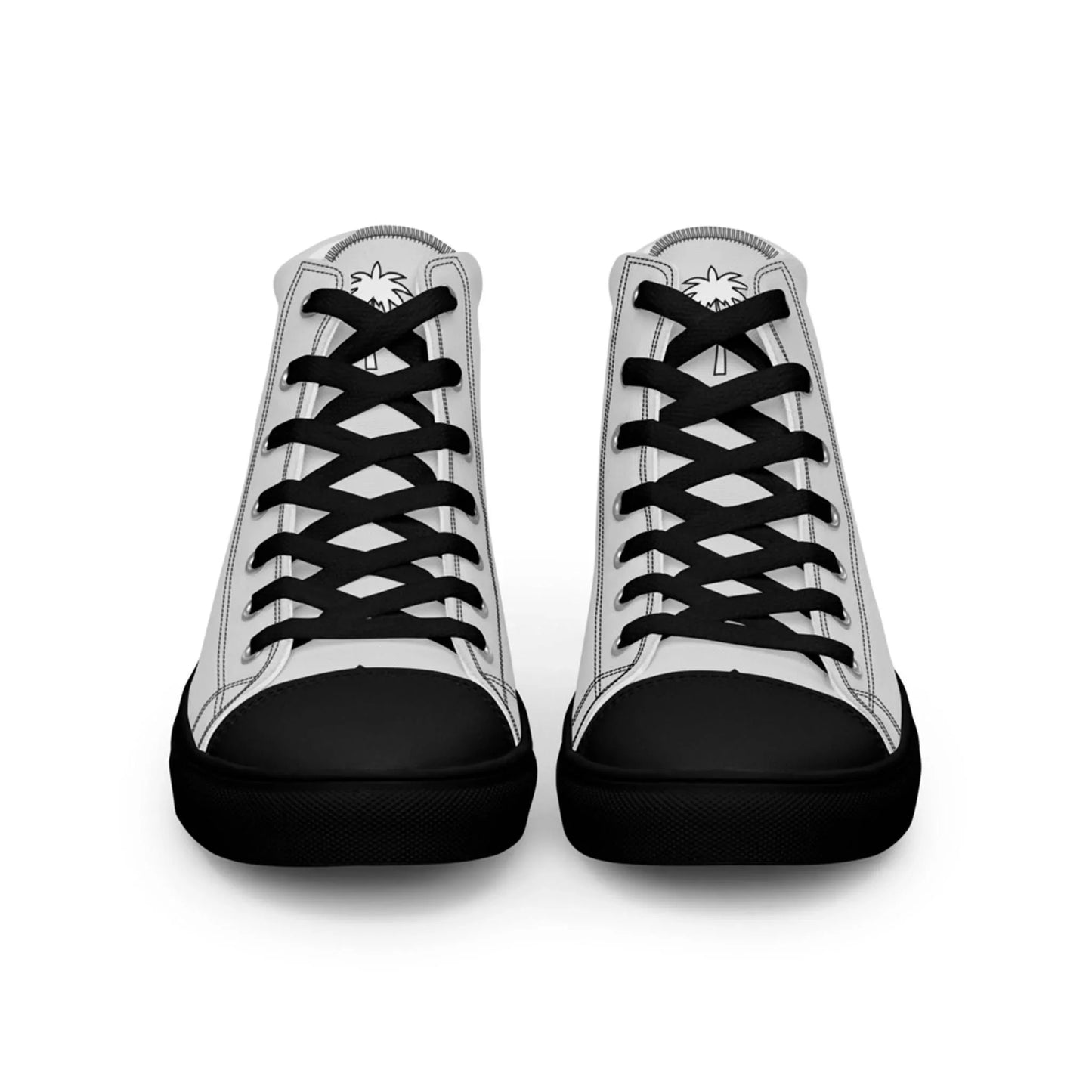 A pair of white Mambí high-top sneakers with black laces, black toe caps, and black soles, viewed from the front. The tongue features a small palm tree graphic.