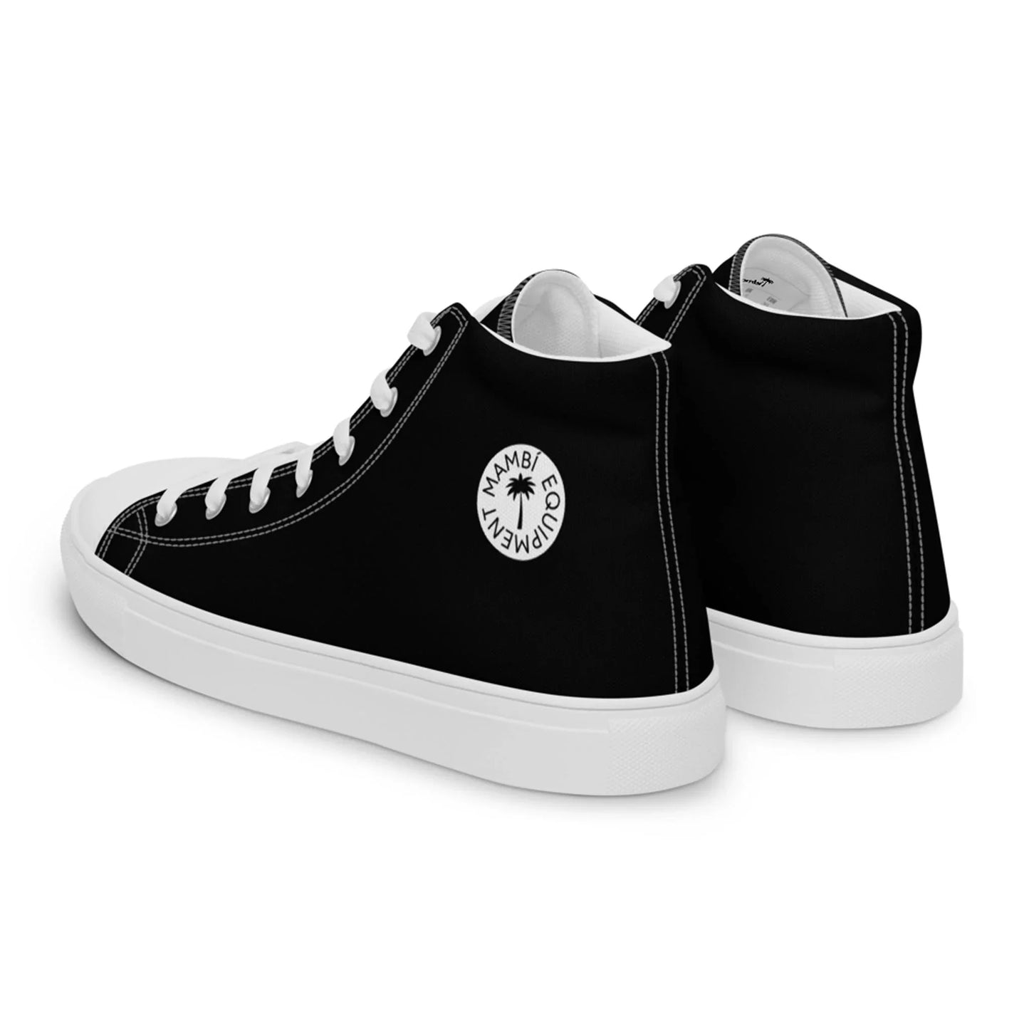 The Carlito Sastre Vintage Hi-Top Sneakers for women by Printful feature a white/black design with white soles and laces, plus a circular MAMBA OUT DIFFERENT logo on the side. The shoes are positioned diagonally and angled away.