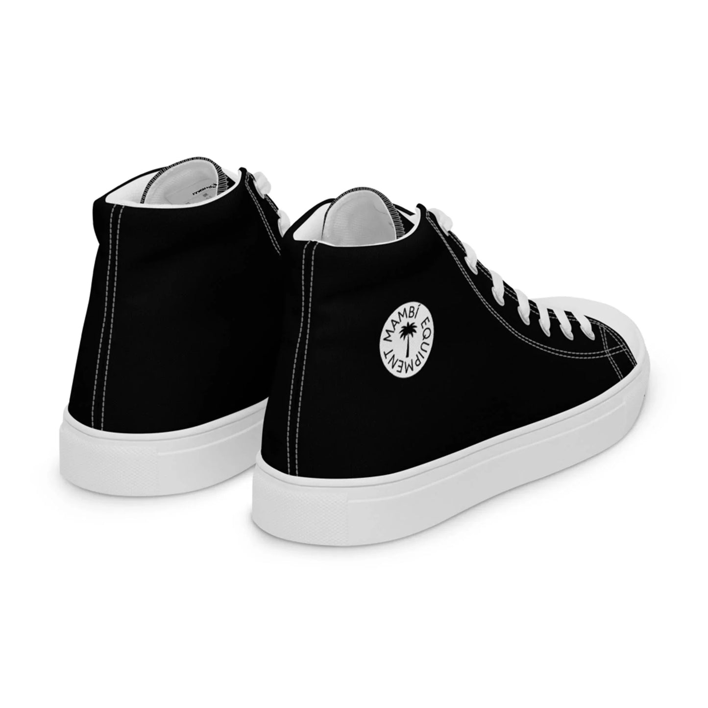 Printfuls Carlito Sastre Vintage Hi-Top Sneakers for women feature a black and white canvas design with white soles, laces, stitching, and a round Mambo Gymwear logo patch with a palm tree on the heel side.