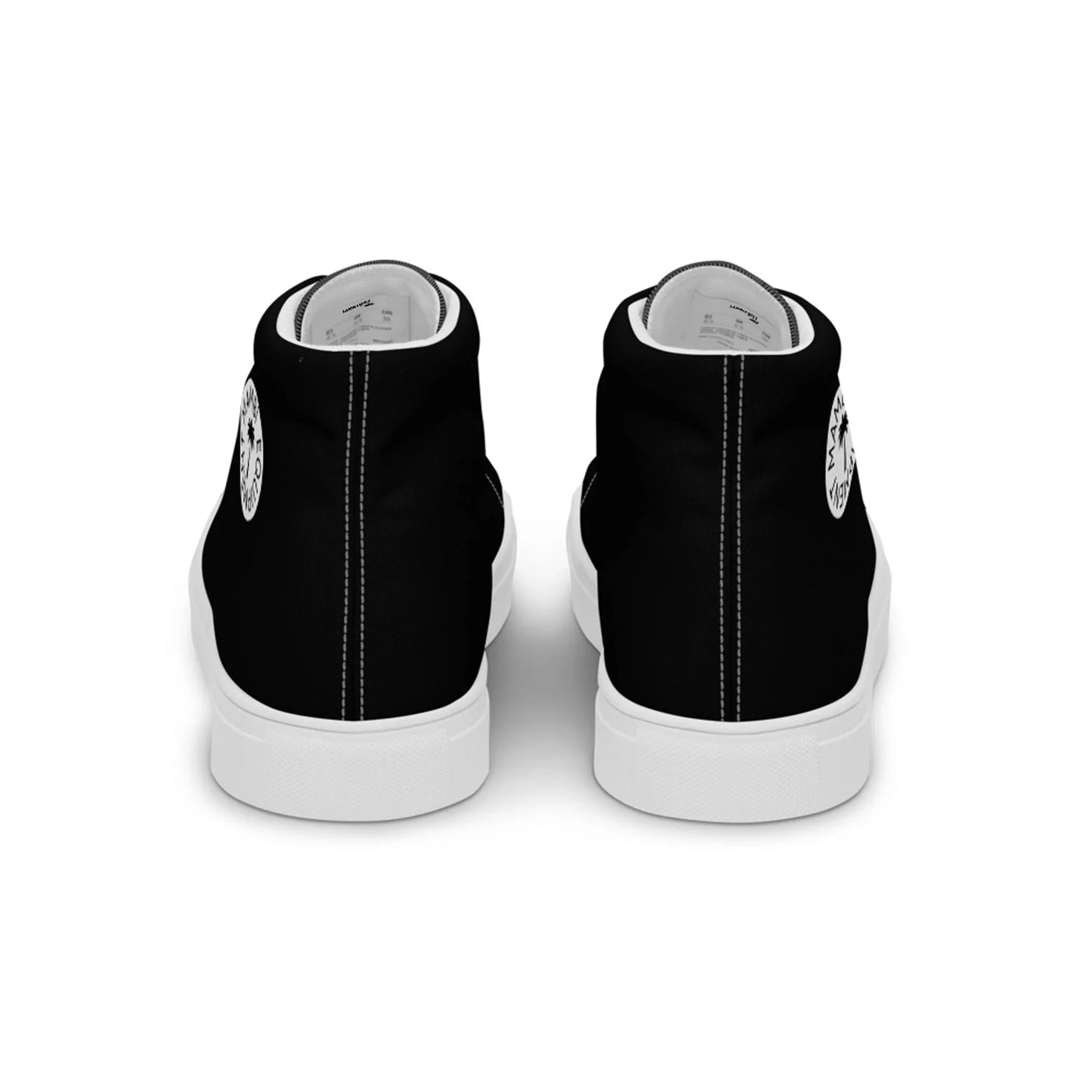 The Carlito Sastre Vintage Hi-Top Sneakers by Printful for women feature black canvas with white soles, a white circular graphic on each heel, and distinctive white stitching along the back seam.