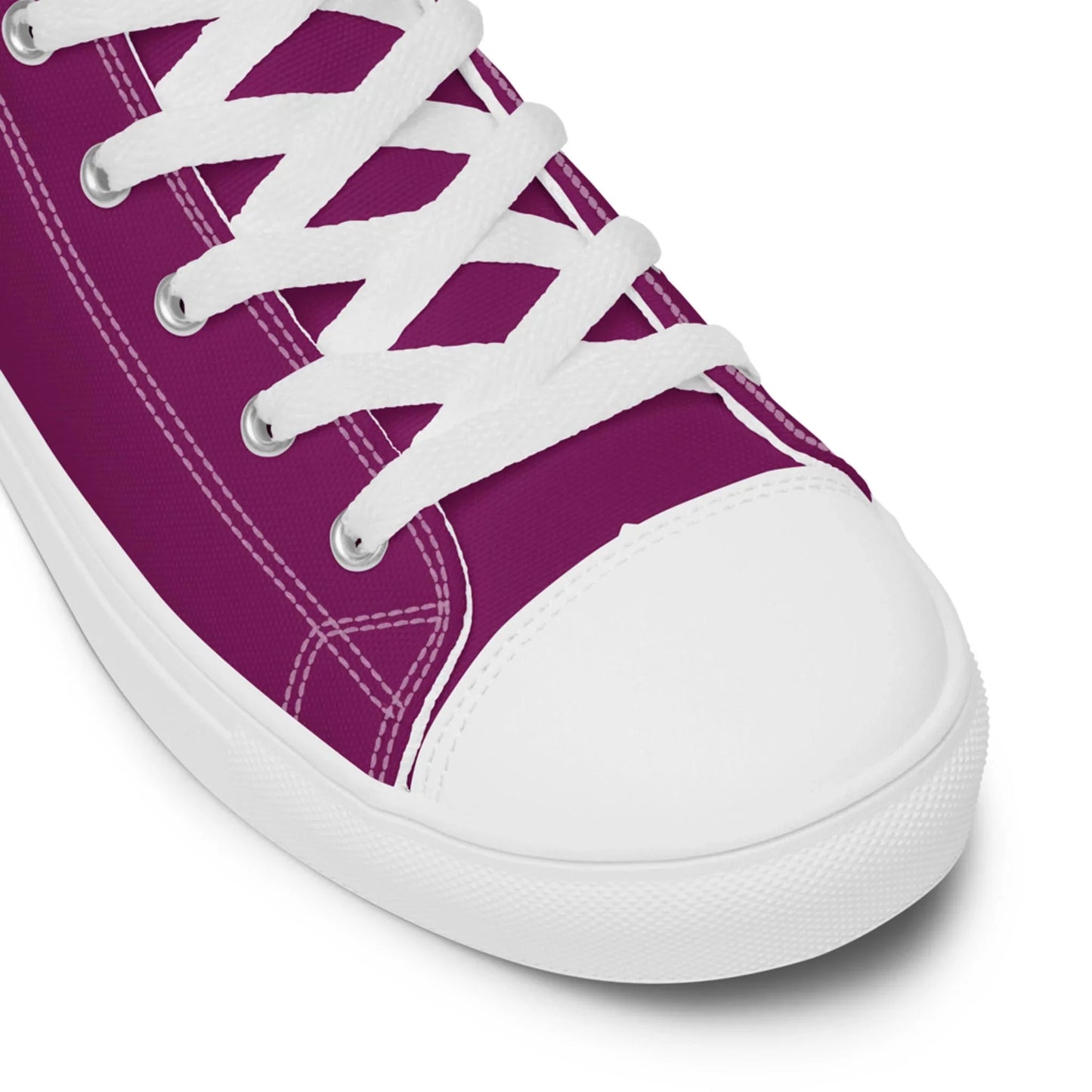 Close-up of Printful Carlito Sastre Vintage Hi-Top Sneakers for women in White/Eggplant, featuring white laces, stitching, rubber toe cap, and sole—angled to highlight the classic front and side design.