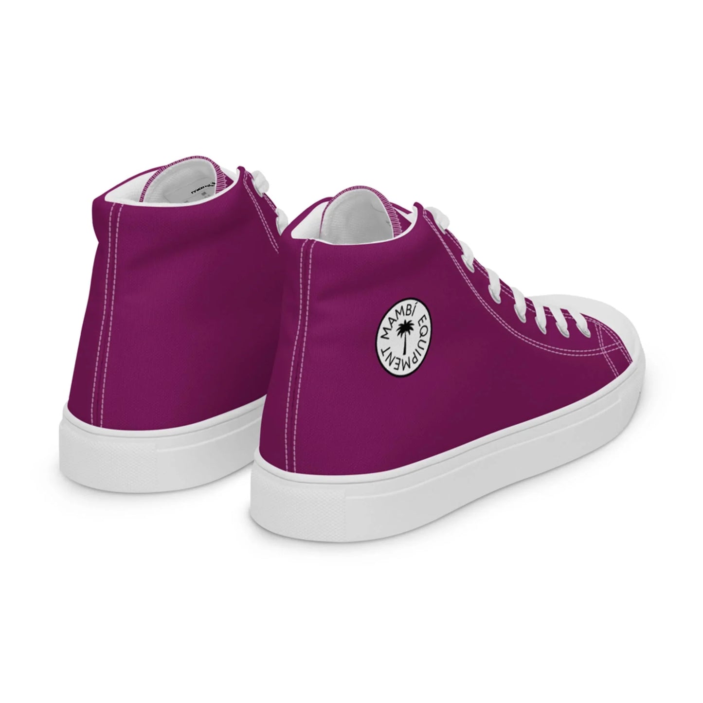 The Carlito Sastre Vintage Hi-Top Sneakers for women by Printful feature eggplant purple canvas, white soles and laces, plus a round white patch with black text and a palm tree design on the side.