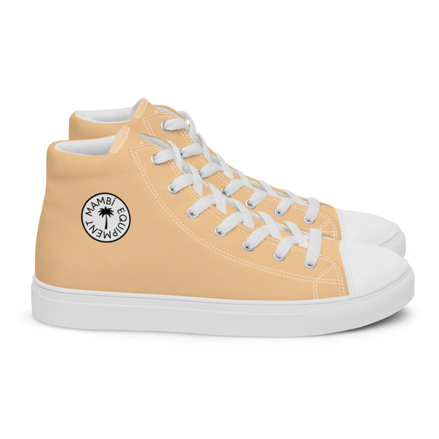 A pair of light beige high-top Mambí sneakers with white laces and soles. The outer side of each shoe features a black circular MAMBI ECQUIPMENT logo, displayed against a plain white background.