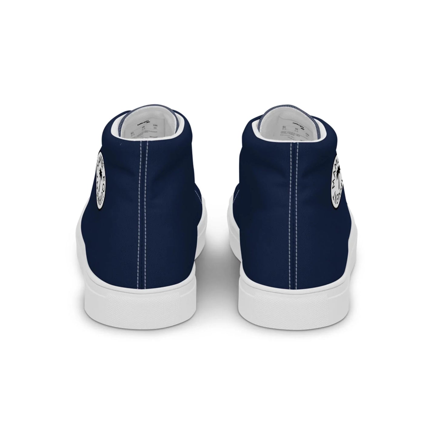The Carlito Sastre Vintage Hi-Top Sneakers by Printful for women feature a navy and white design with white soles, a circular black-and-white logo on each heel, and clean white canvas interiors.