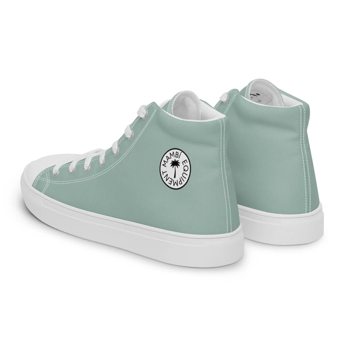 A pair of light green high-top sneakers with white laces and soles. A circular Mambí logo featuring the words MAMBA CUPIDIMVEL and a star appears on the outer side of each shoe.
