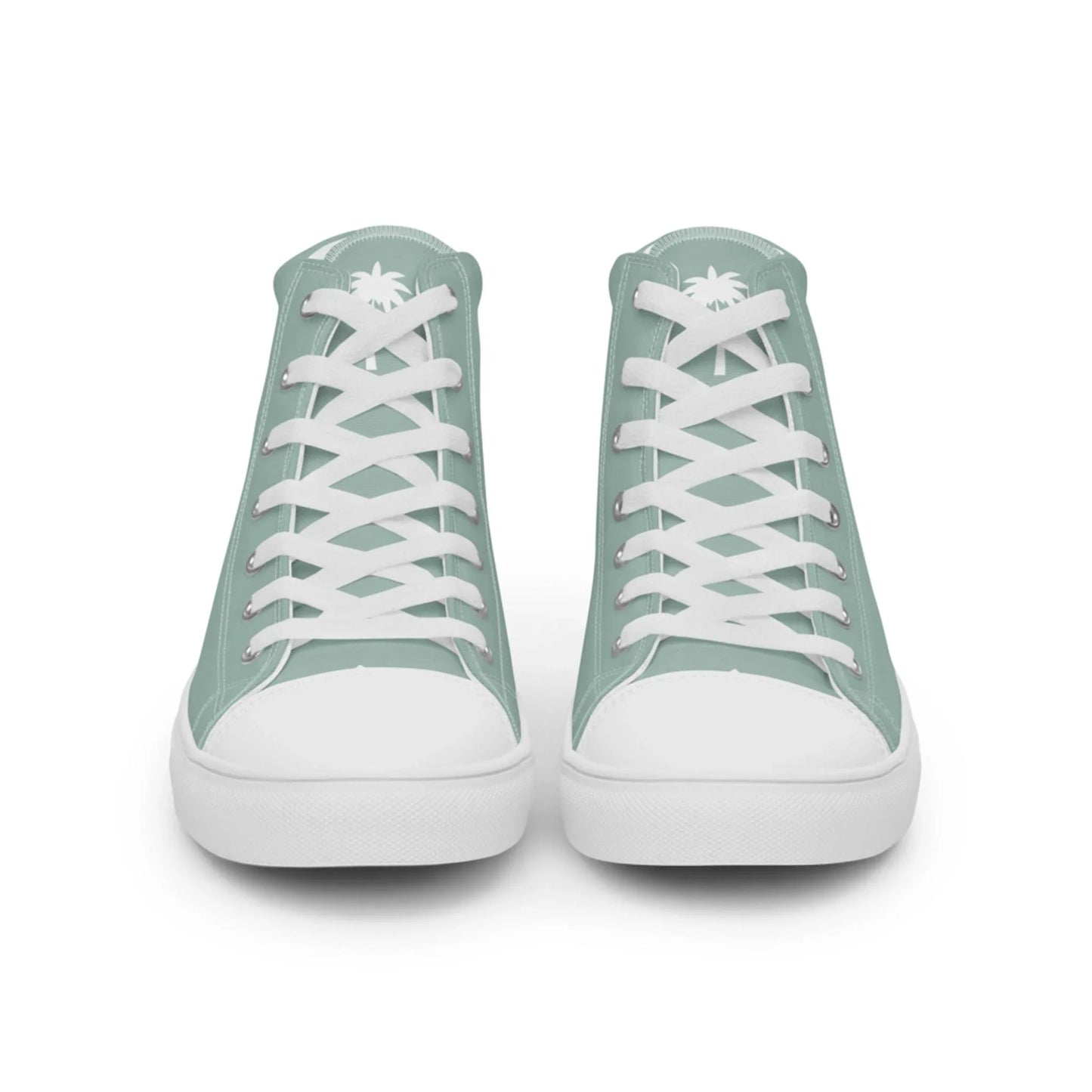 A pair of mint green high-top sneakers with white laces and soles, viewed from the front. A subtle white palm tree graphic and the word Mambí are visible on the tongue of each shoe.
