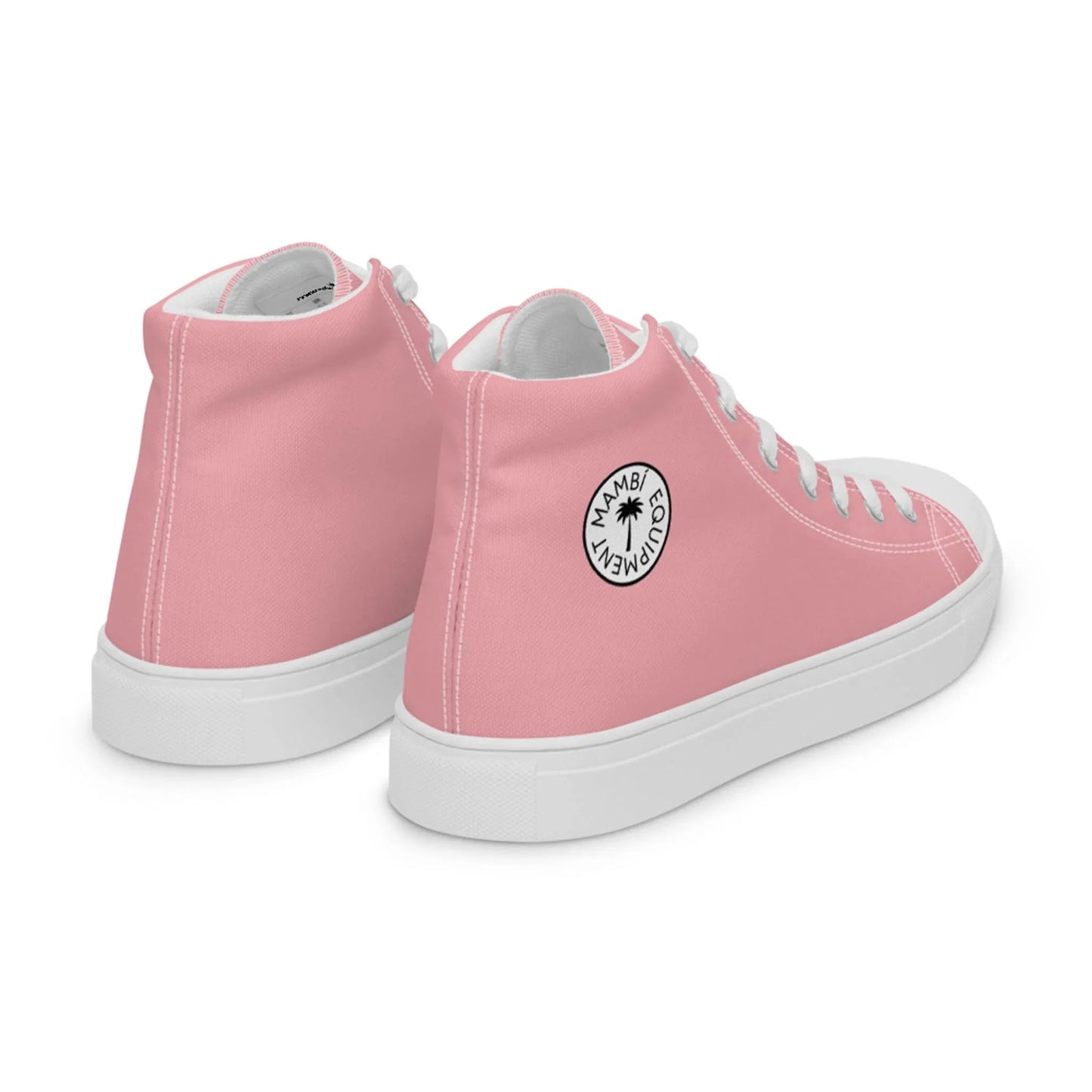 The image shows two Carlito Sastre Vintage Hi-Top Sneakers for women by Printful in white and pink, each featuring a circular black and white Mambi Movement palm tree logo. Both the back and side views of these canvas sneakers with white soles and laces are visible.
