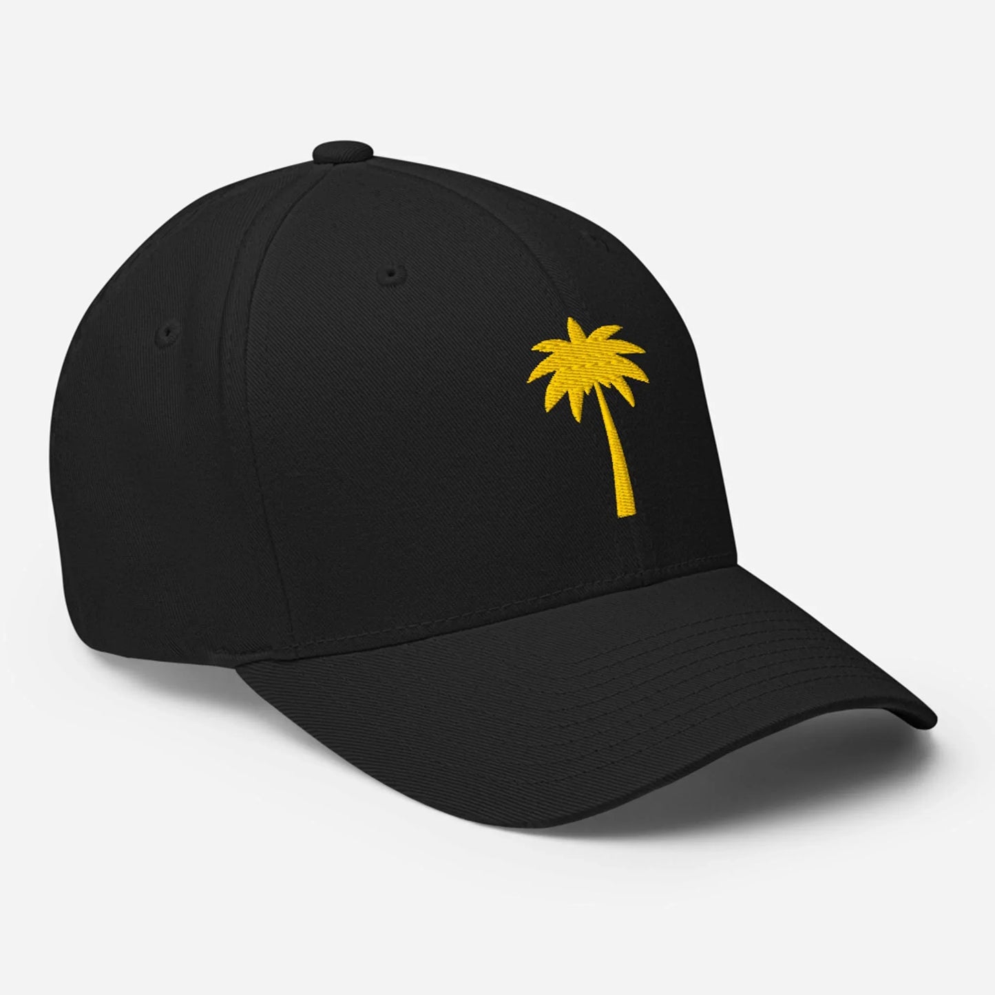 A black baseball cap featuring a small, yellow palm tree embroidered on the front left panel and a subtle Mambí detail, set against a plain white background.