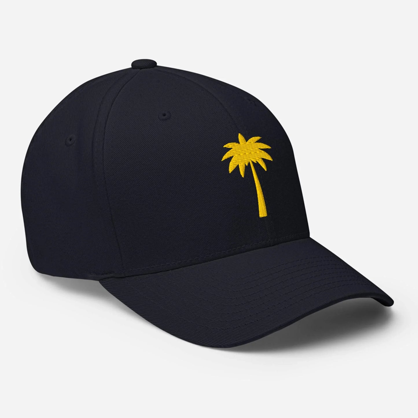 A black baseball cap featuring a simple yellow palm tree embroidered on the front, with a curved brim, visible stitching details, and subtle Mambí style.