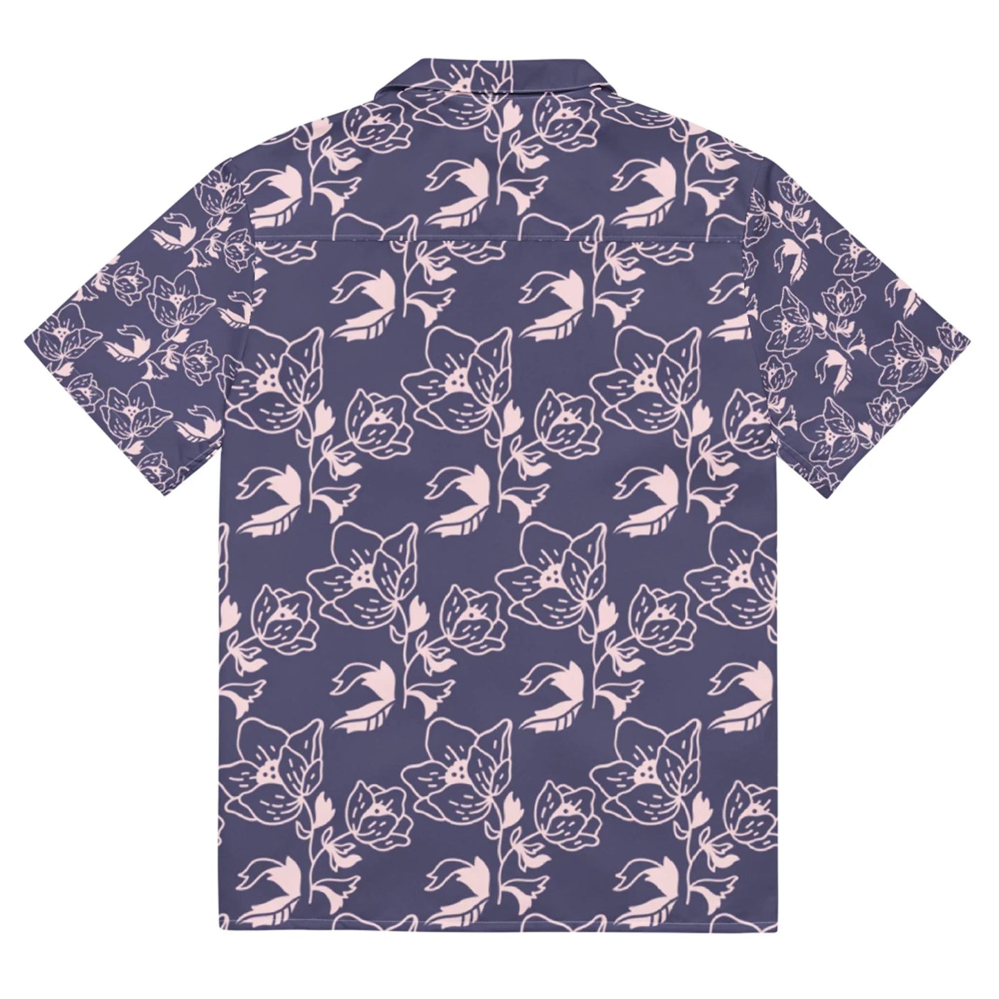 Short-sleeve button-up shirt with a dark purple background and light pink floral and cat face pattern, shown from the back. A unique Mambí style adds flair to this playful design.