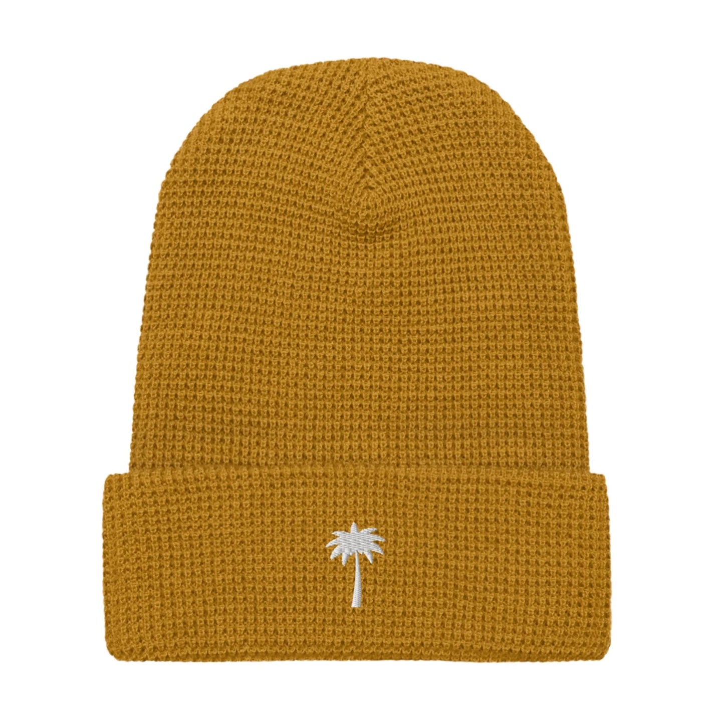 A mustard yellow knit beanie with a folded brim, featuring a small white palm tree and subtle Mambí embroidery on the front center.