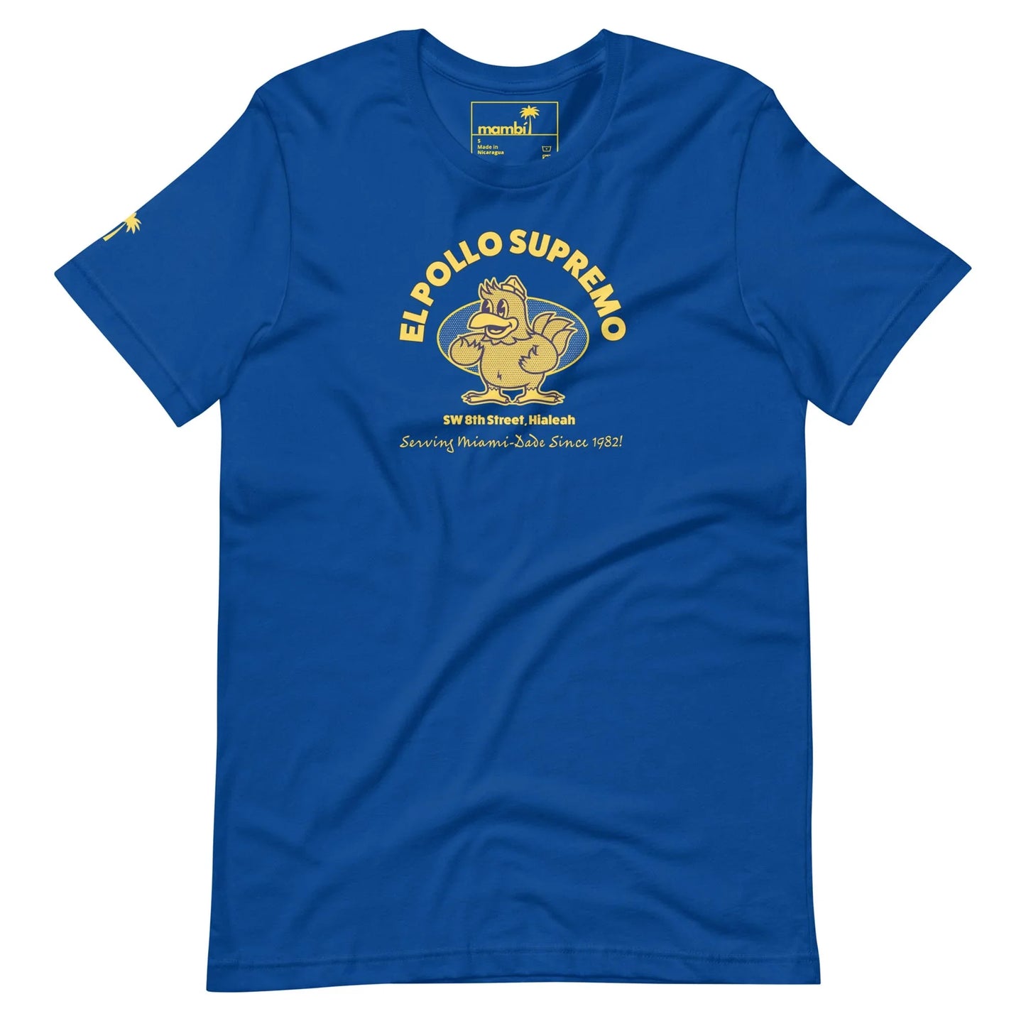 Blue t-shirt featuring a cartoon chicken flexing its arm, with the text EL POLLO SUPREMO above it and SW 8th Street, Hialeah. Celebrating Mambí pride, “Serving House-Made Diso Since 1982” is printed below in yellow.