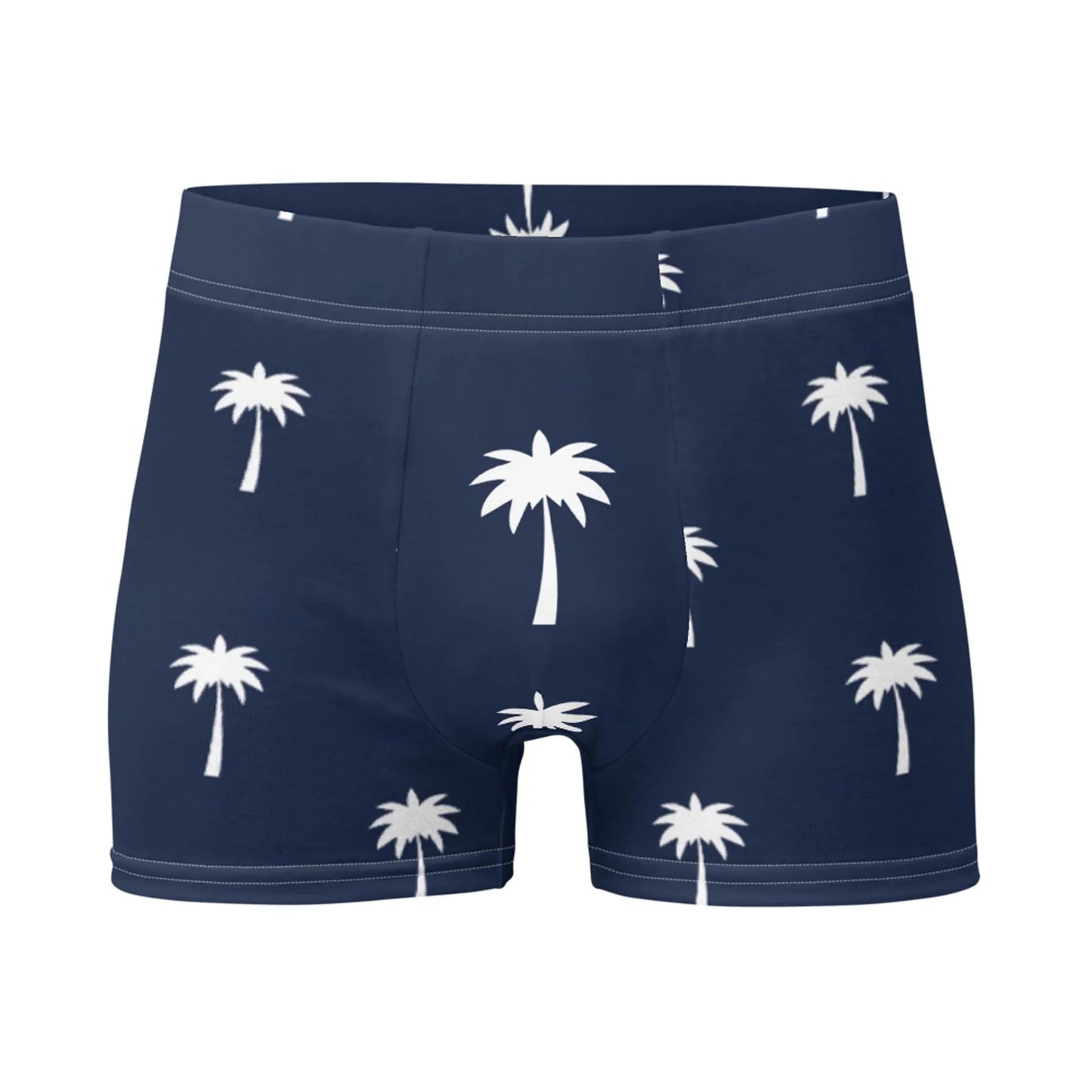 The Emerson Boxer Brief by Printful in navy blue features a white palm tree pattern and a seamless, no-back-seam design, shown against a plain white background.