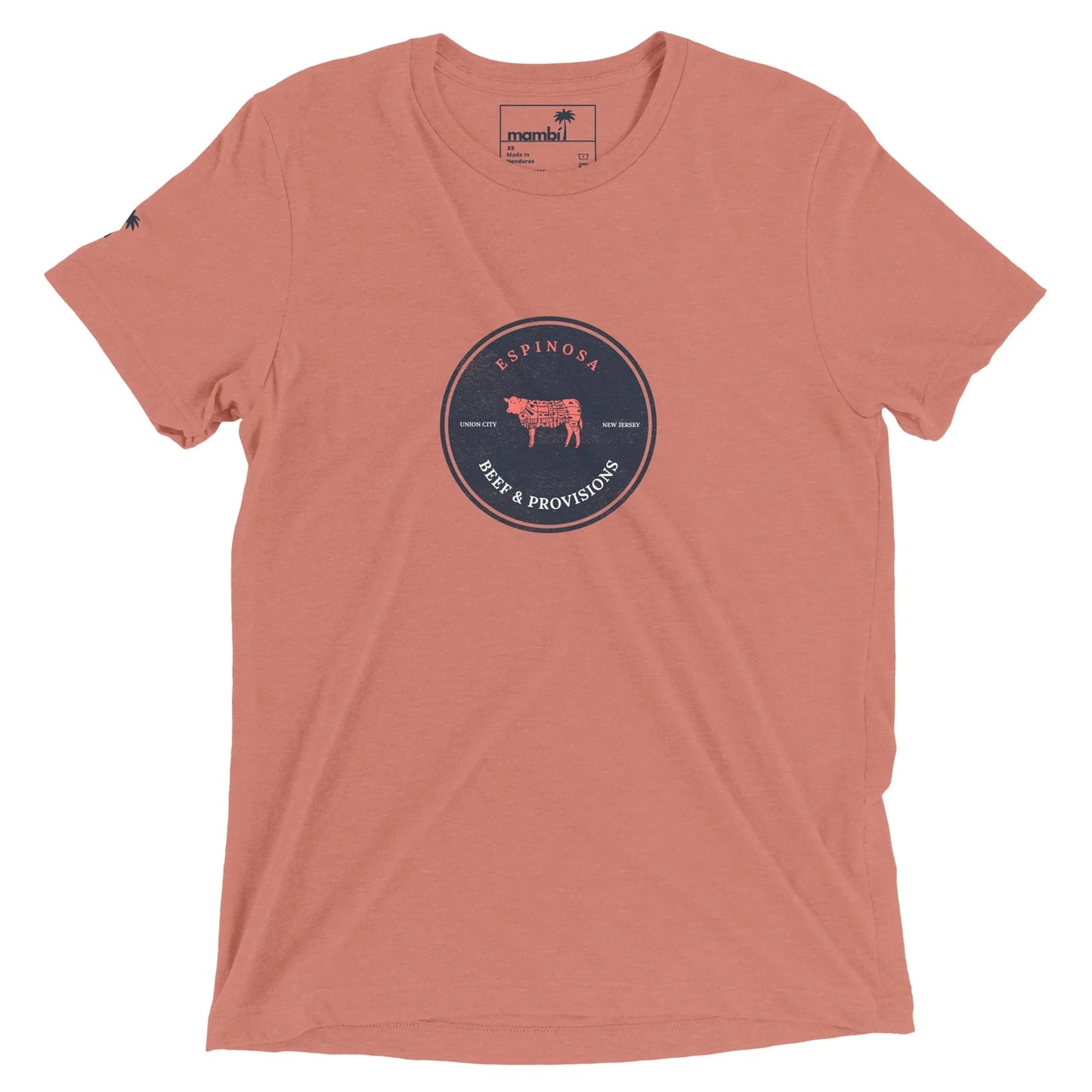 Light red short-sleeve t-shirt featuring a circular navy logo with a cow and the text ESPINOSA BEEF & PROVISIONS at the center. The neck label highlights Mambí.