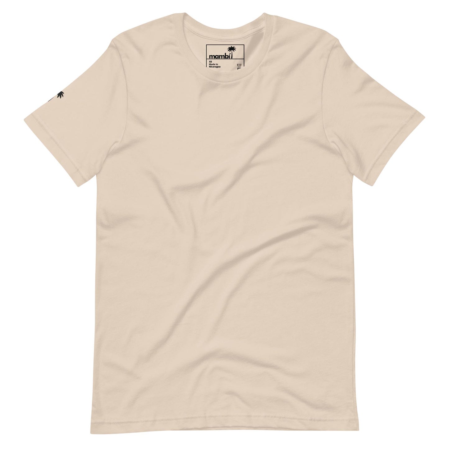 A plain beige Mambí t-shirt with a small black palm tree logo on the left sleeve and a visible black and white neck tag, laid flat against a white background.