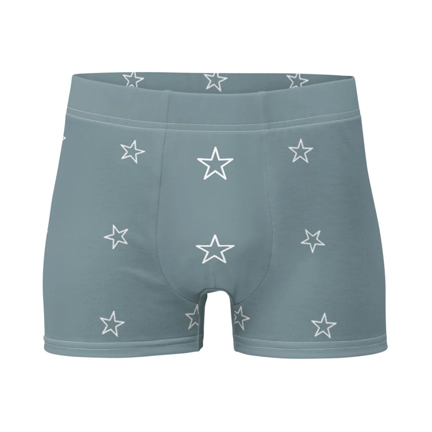 Light blue Mambí men’s boxer briefs featuring a pattern of white outlined stars on a plain white background.