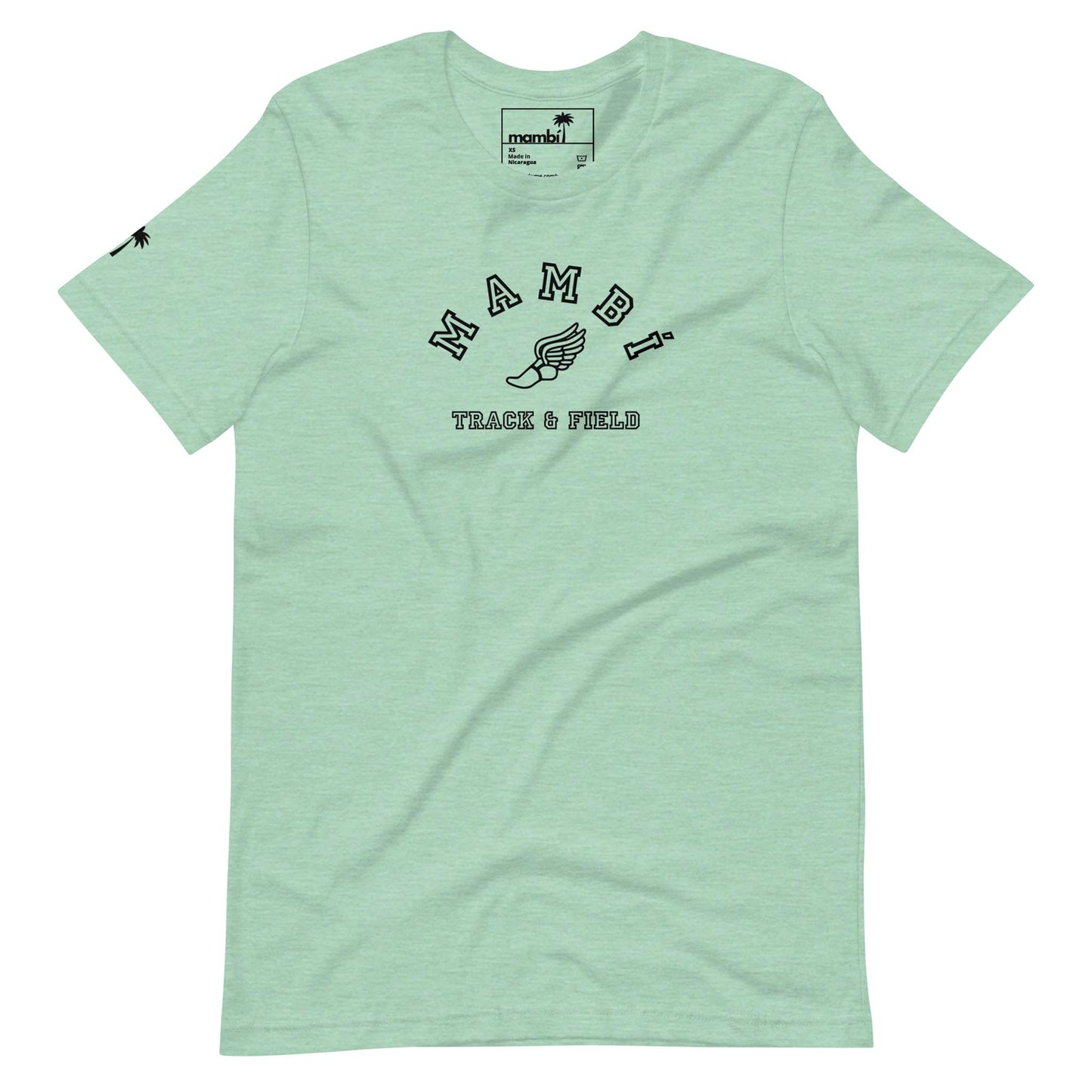 Light green t-shirt featuring Mambí in bold black arched text, a winged shoe graphic below, and TRACK & FIELD underneath. A small palm tree logo accents the left sleeve.