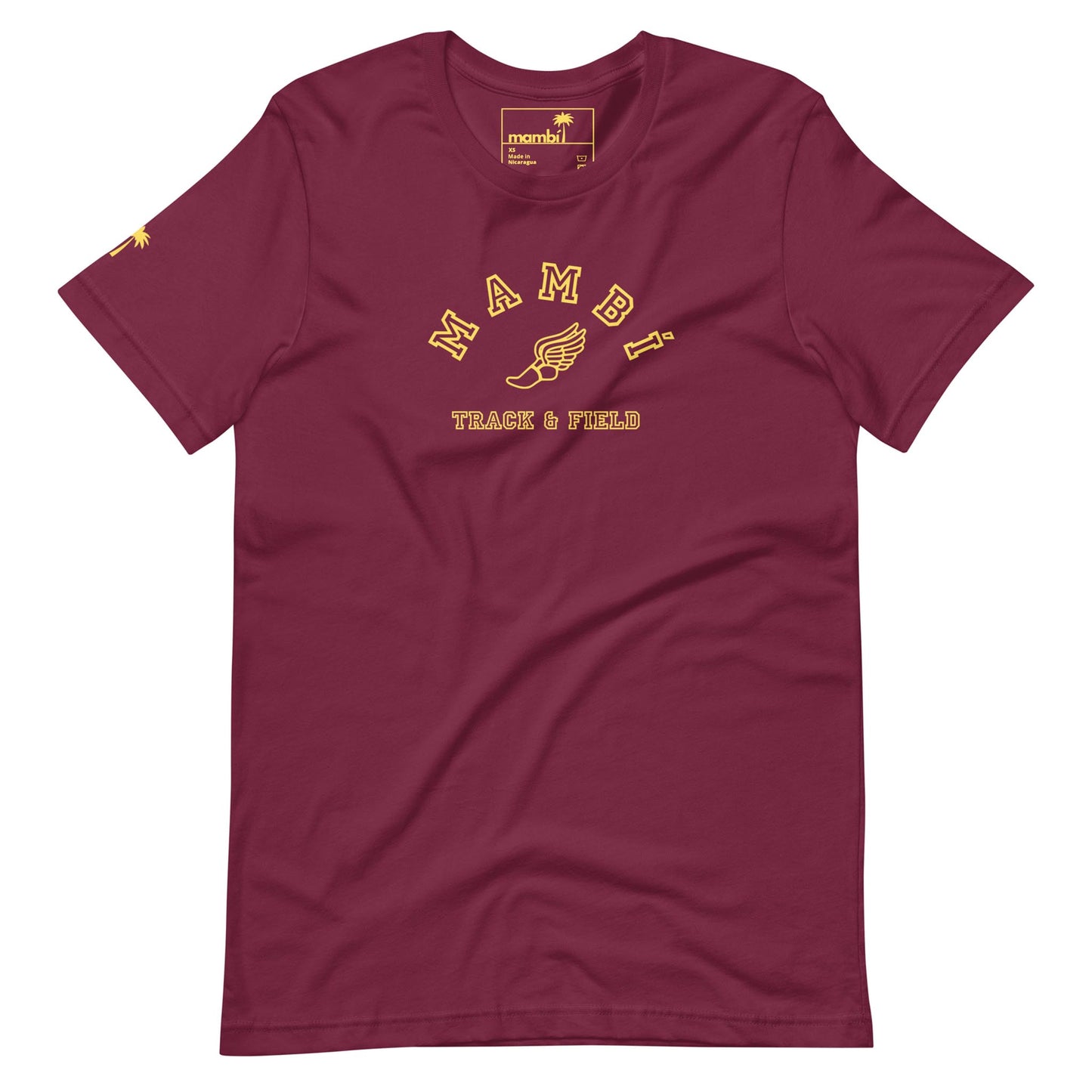 A maroon t-shirt with yellow text that reads Mambí Track & Field and features a winged shoe graphic between the words. The shirt has short sleeves and a crew neckline.