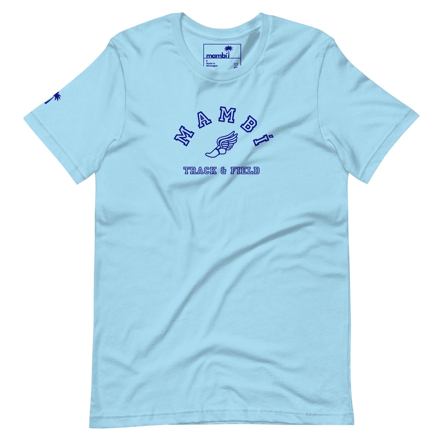 Light blue t-shirt featuring the text “Mambí” with a winged foot graphic underneath and “TRACK & FIELD” below it, all in dark blue. Includes a small logo on the sleeve.