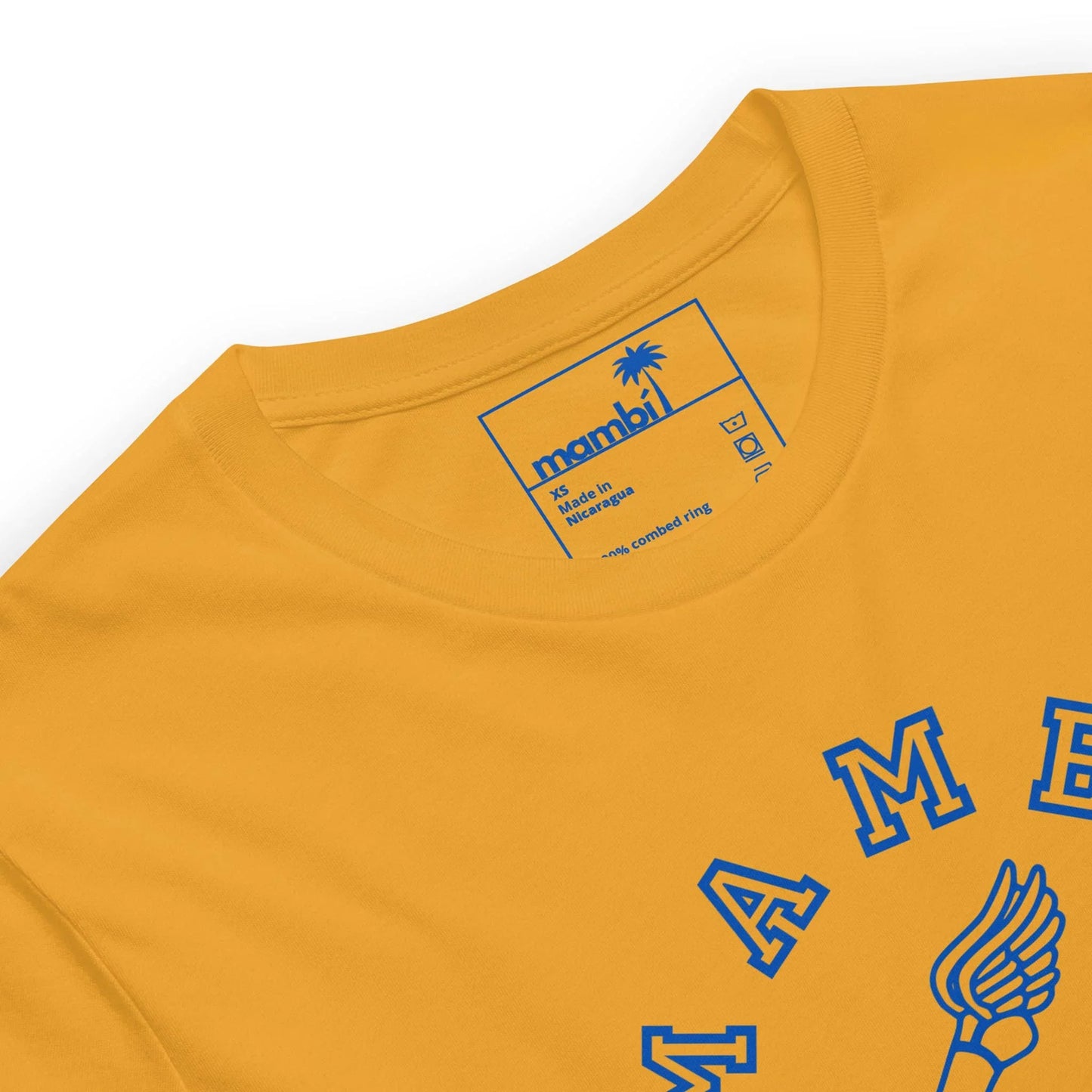 A close-up of the yellow Falcon Varsity Track & Field Tee by Printful, featuring a blue label inside the collar with size and care details. The front shows part of a royal graphic and lettering, blending retro style with modern comfort.
