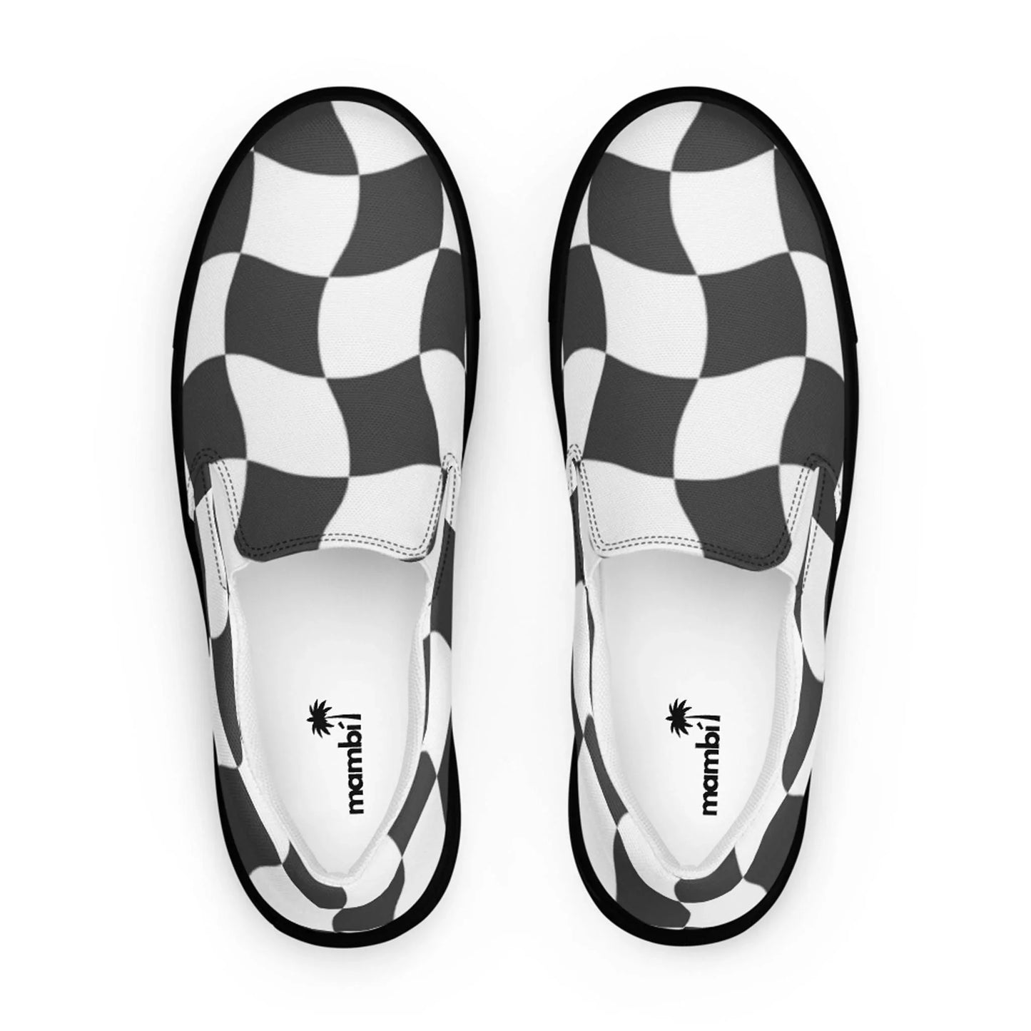 A pair of slip-on shoes with a black and white wavy checkered pattern on top, viewed from above. The shoes feature white interiors and distinctive Mambí branding printed inside.