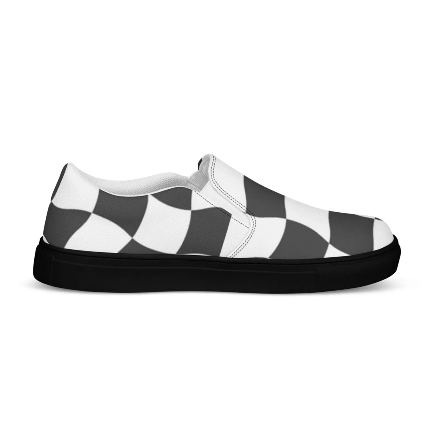 A slip-on sneaker featuring a black and white checkered wave pattern on the upper, inspired by Mambí style, with a solid black sole, viewed from the side.