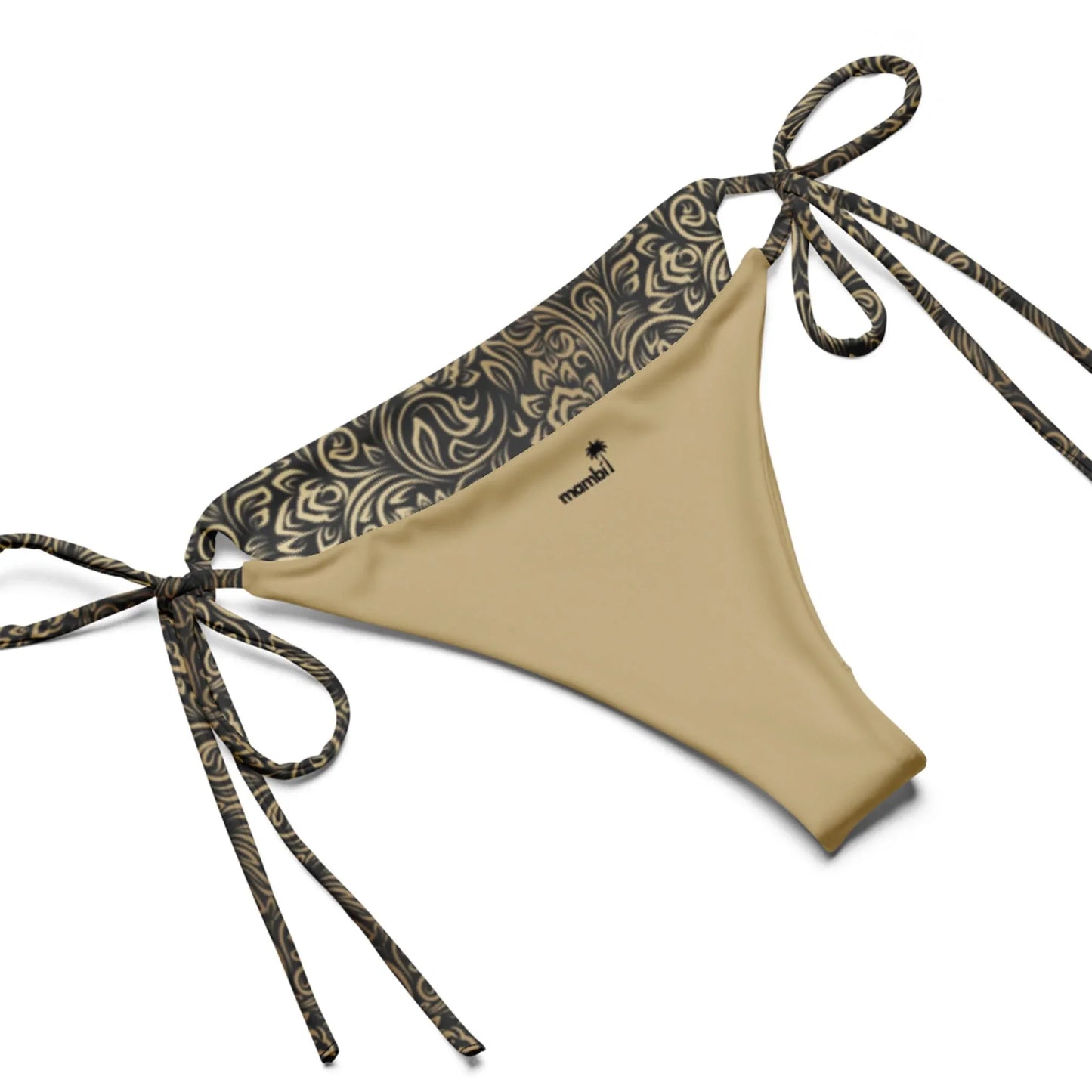 The Flavia String Bikini Swimsuit by Printful features a beige bottom with black and white paisley-style patterned waistband, crafted from recycled polyester, and adjustable side tie strings, shown laid flat on a white background.