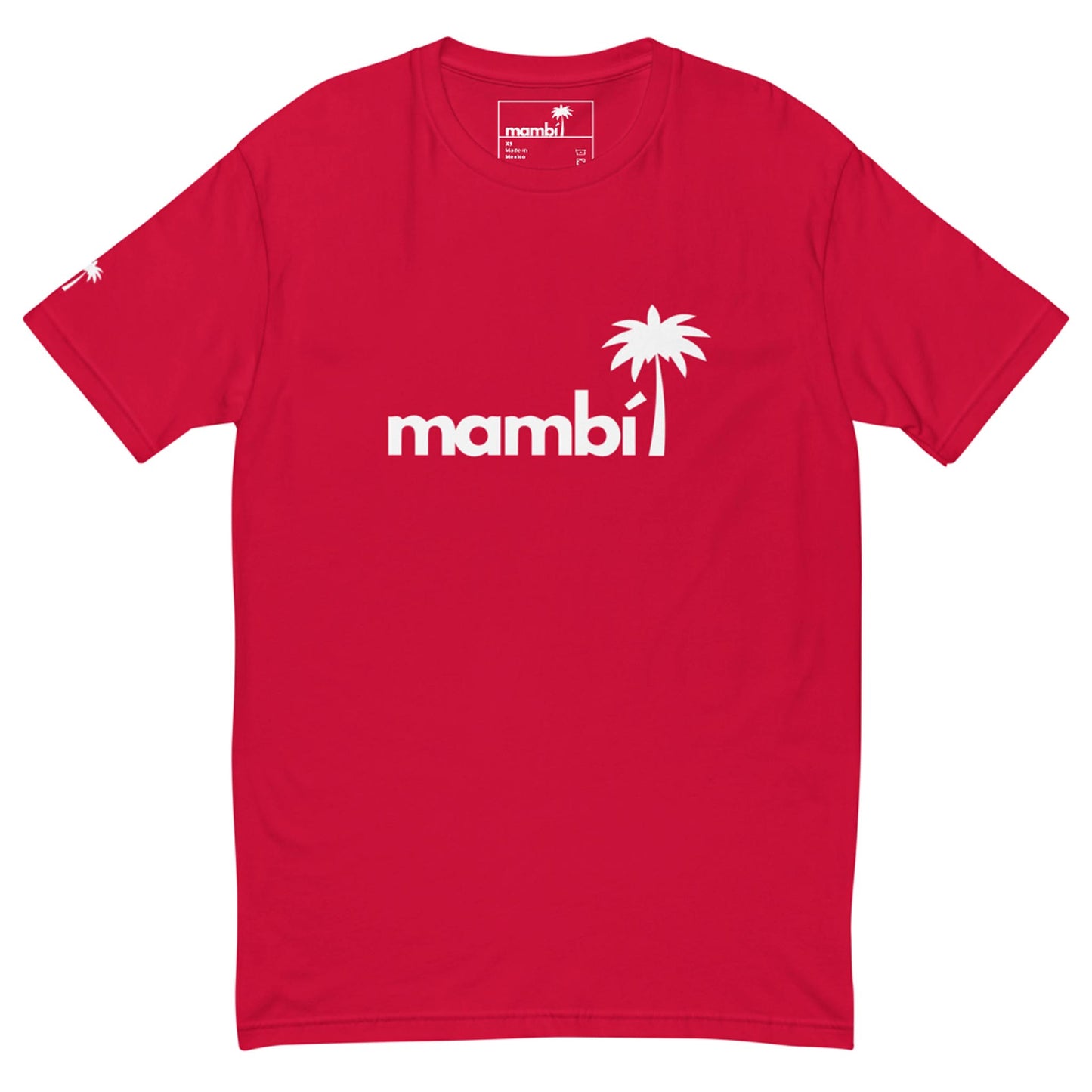 Red t-shirt featuring the word Mambí in white lowercase letters across the chest, with a palm tree graphic replacing the dot over the i. A small palm tree also appears on the left sleeve.